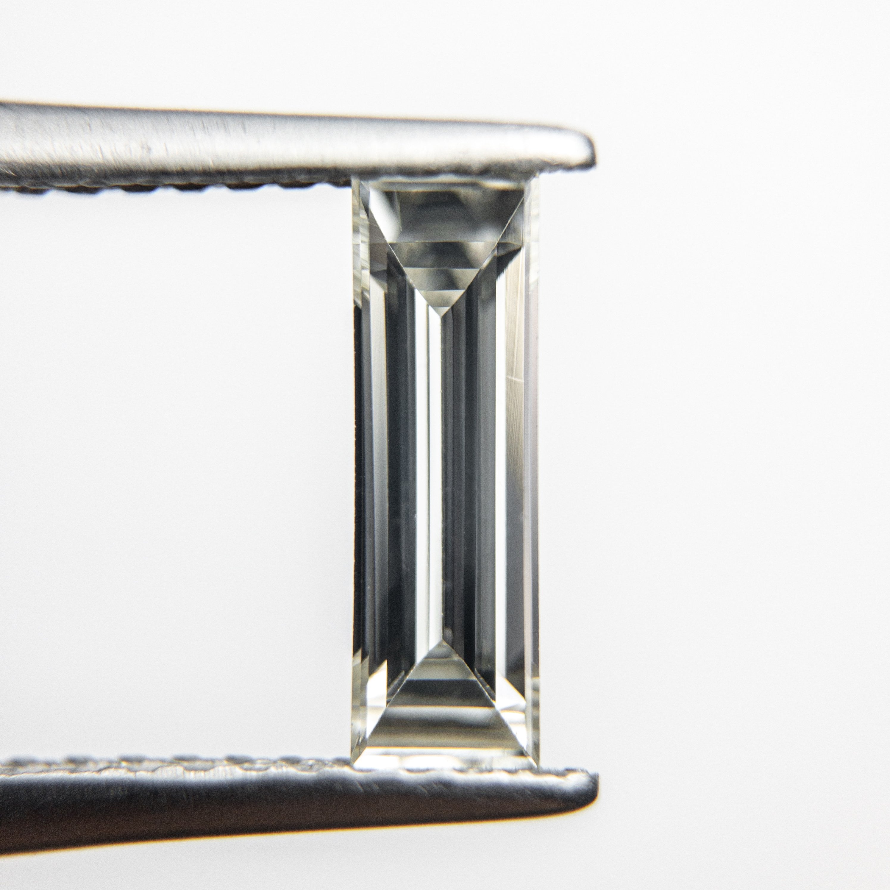 0.55ct 9.70x3.00x1.88mm VS2 K Baguette Step Cut 18279-01 HOLD D1159 9/15/20