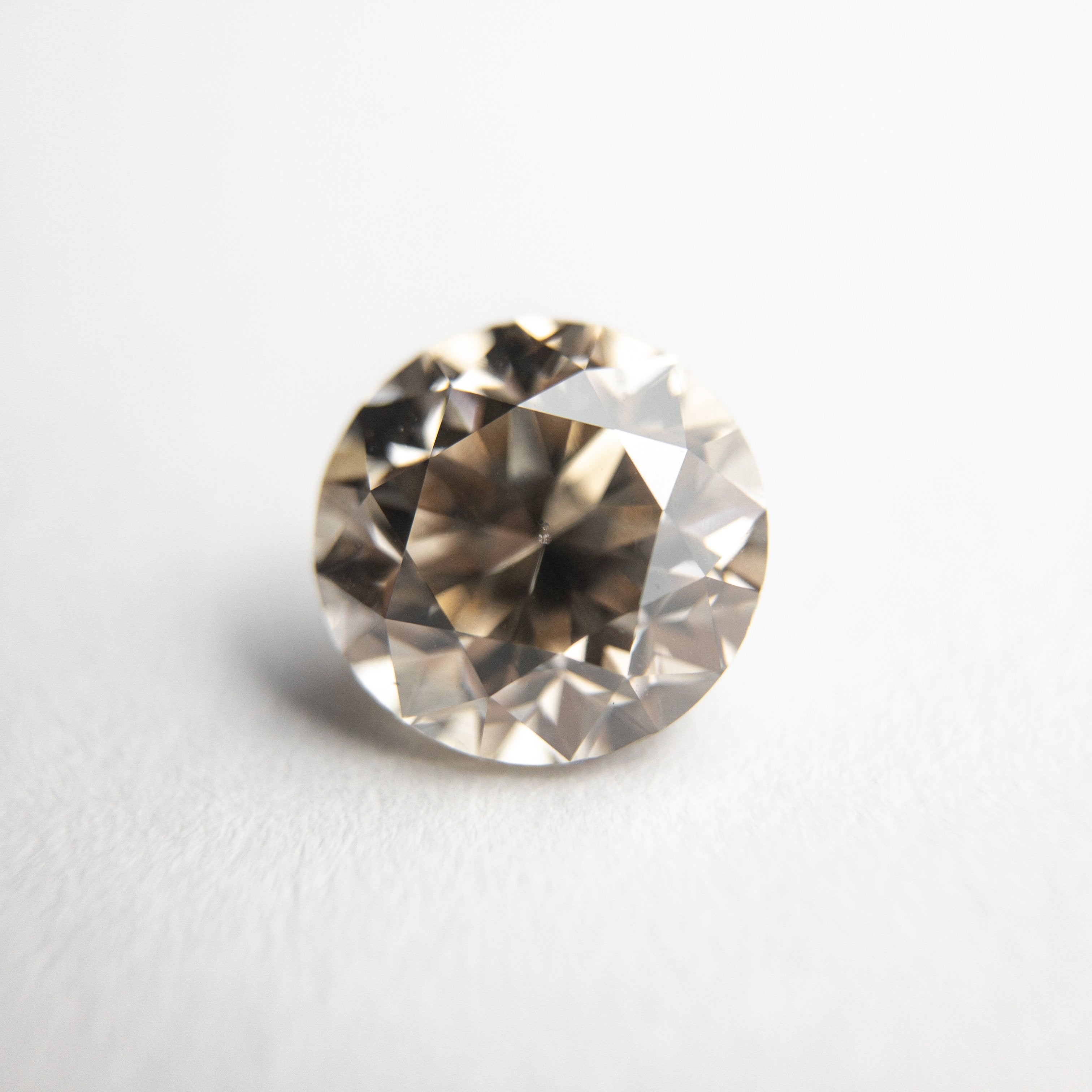 1.51ct 6.85x6.86x4.83mm SI2 Champagne Round Brilliant 18305-02
