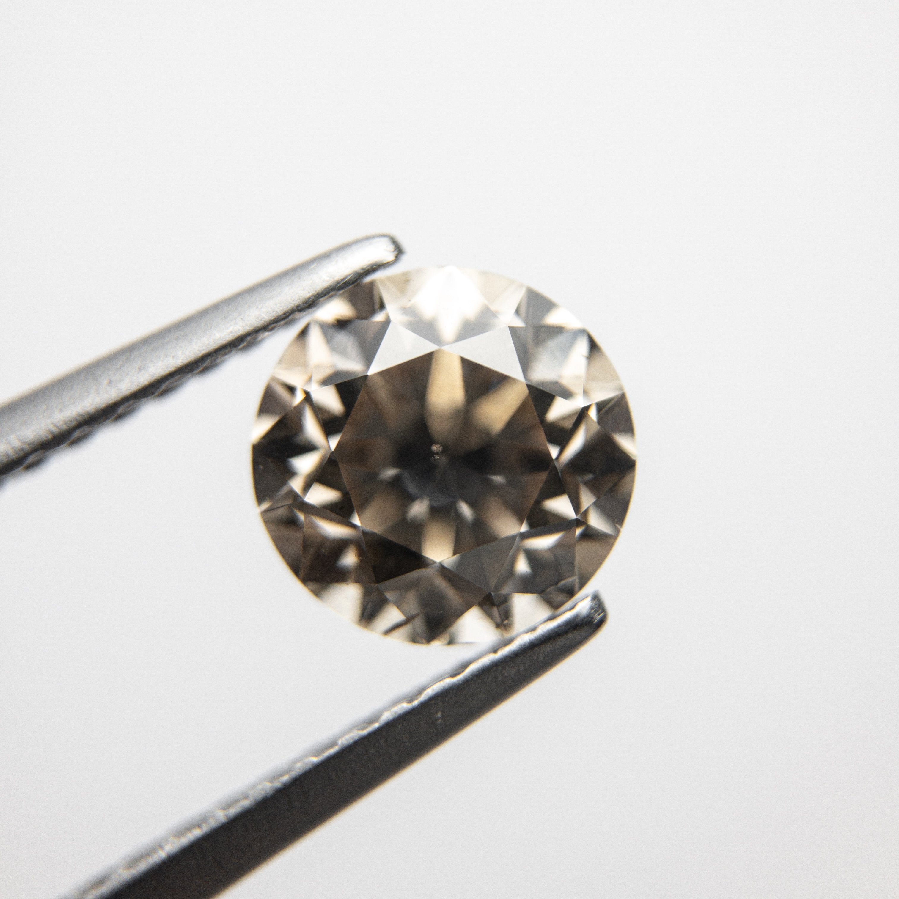 1.51ct 6.85x6.86x4.83mm SI2 Champagne Round Brilliant 18305-02