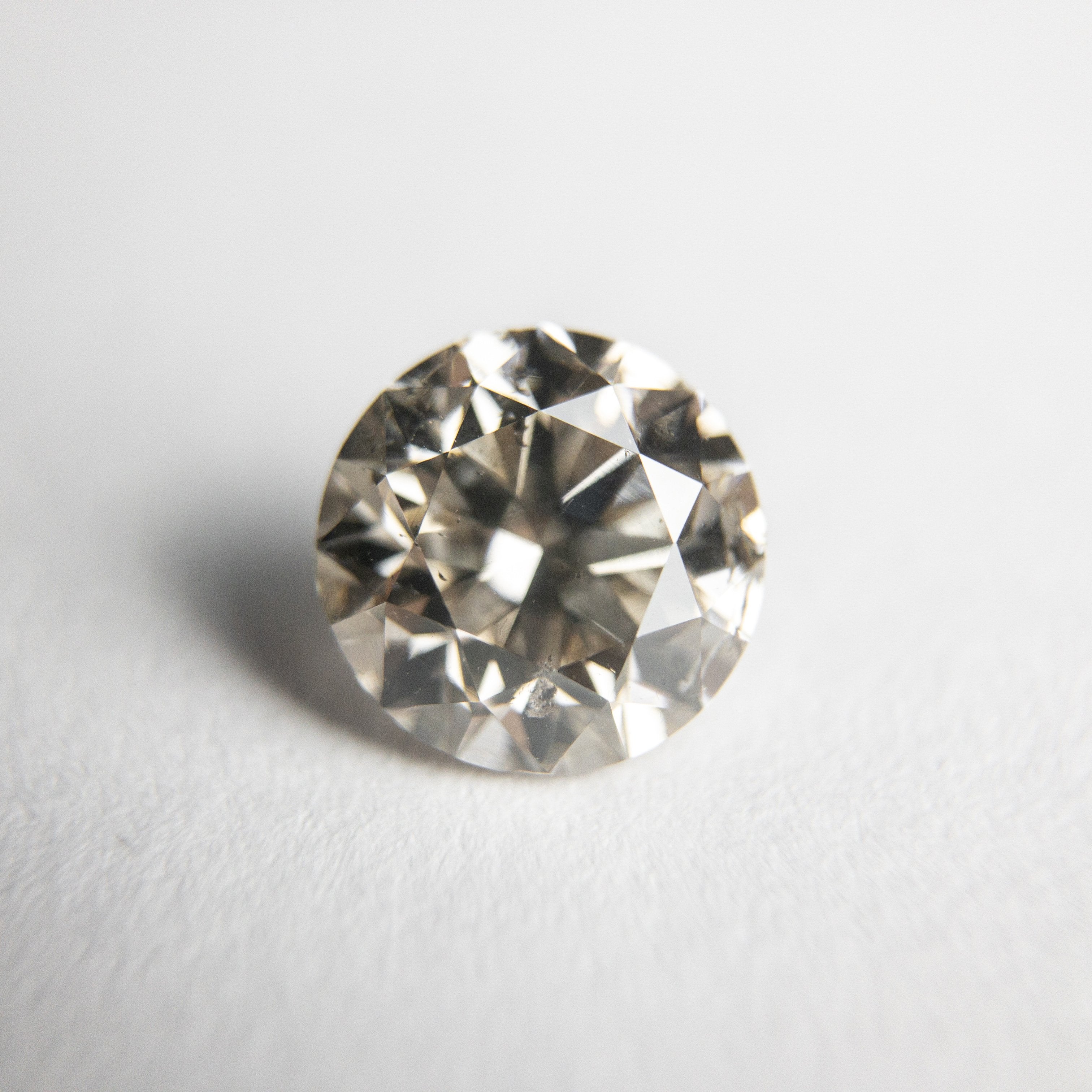 1.33ct 6.84x6.78x4.40mm I1 K-L Round Brilliant 18305-04 Hold #D1889