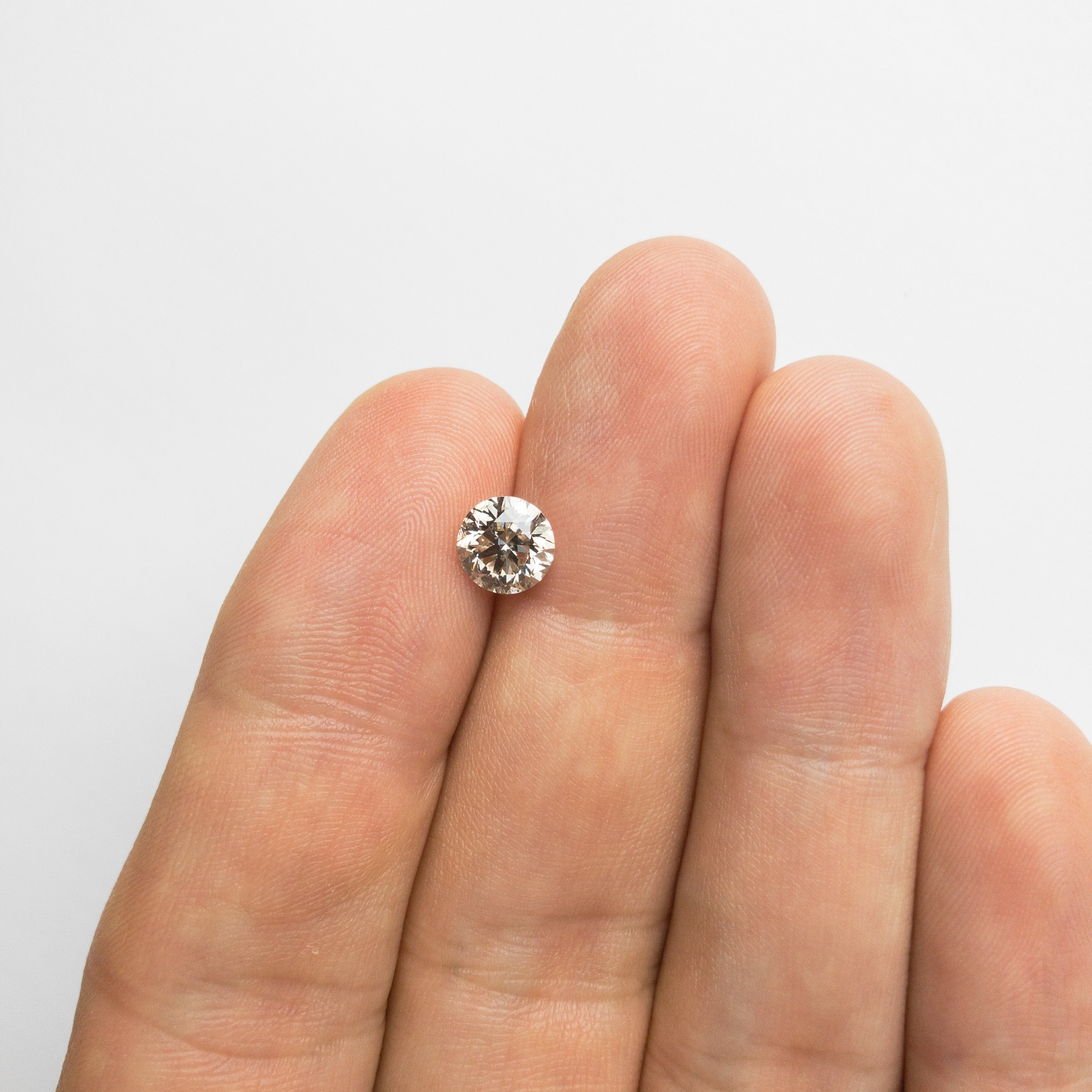 1.33ct 6.84x6.78x4.40mm I1 K-L Round Brilliant 18305-04 Hold #D1889