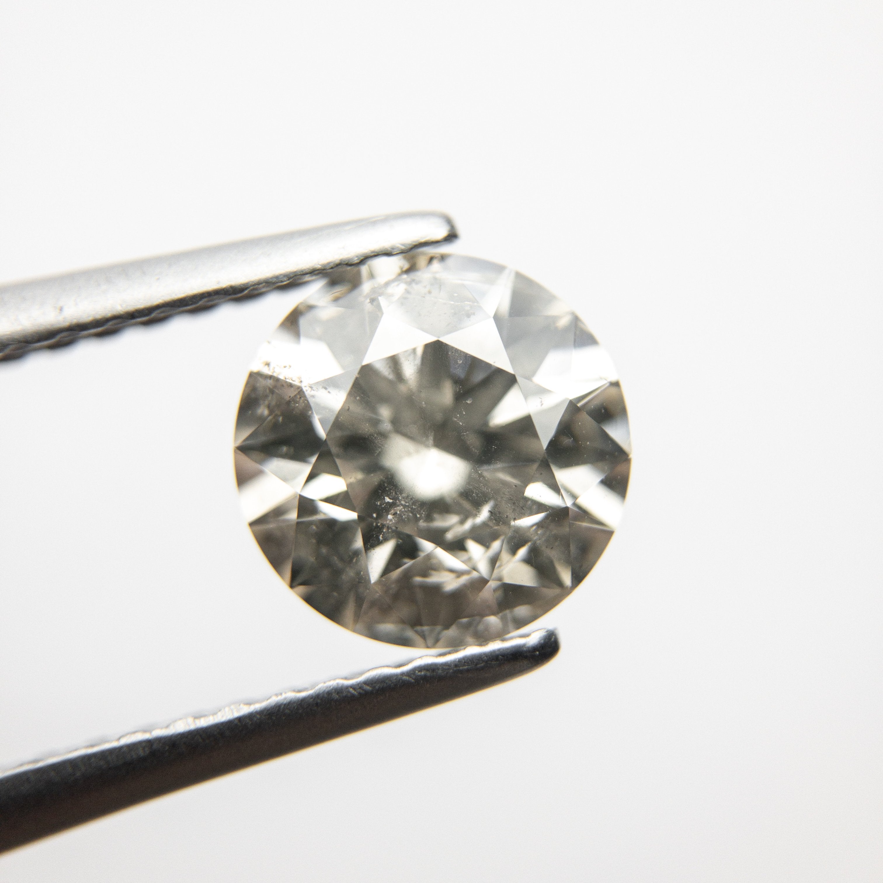 1.52ct 7.30x7.31x4.62mm Round Brilliant 18306-01 HOLD D1442 11/11/20