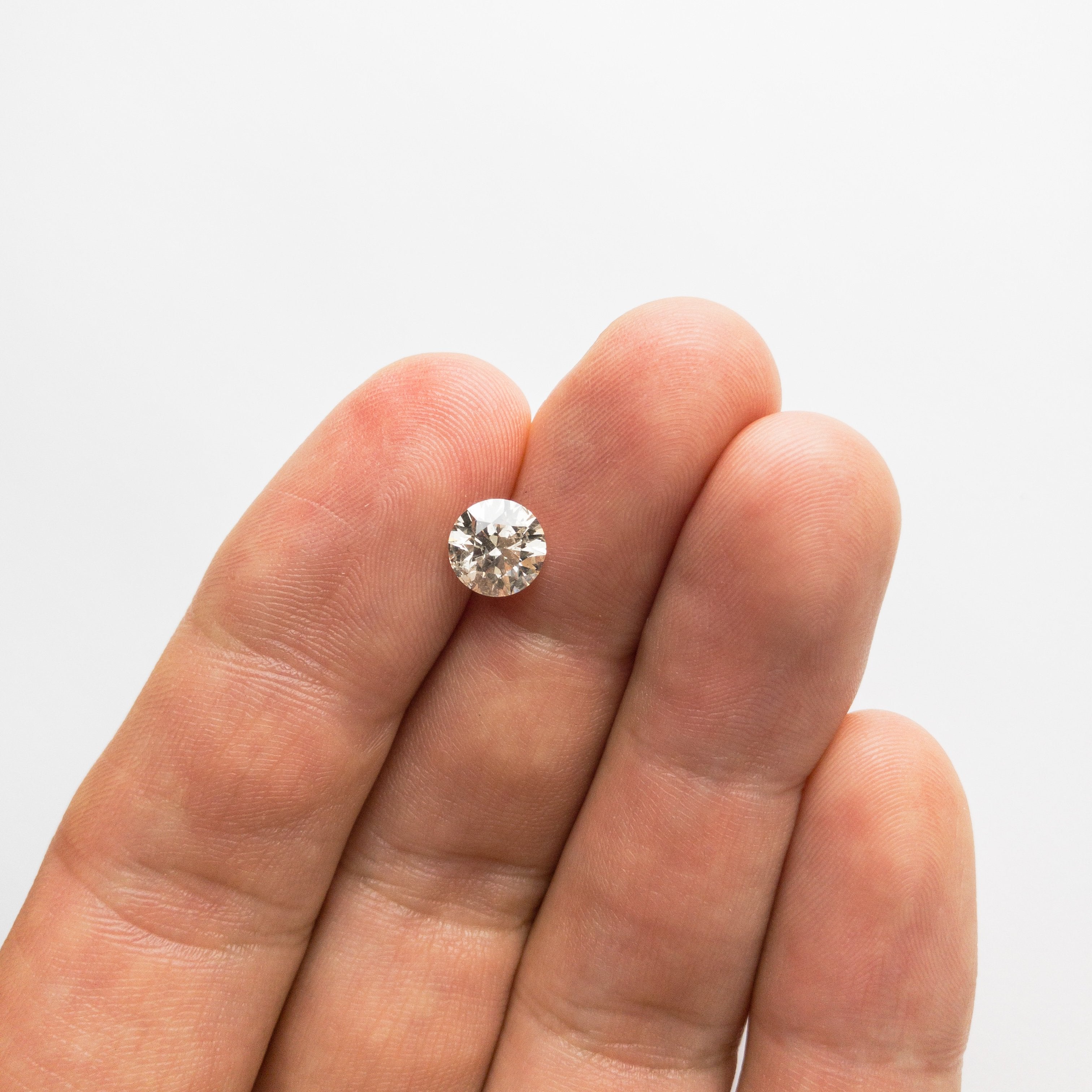 1.52ct 7.30x7.31x4.62mm Round Brilliant 18306-01 HOLD D1442 11/11/20