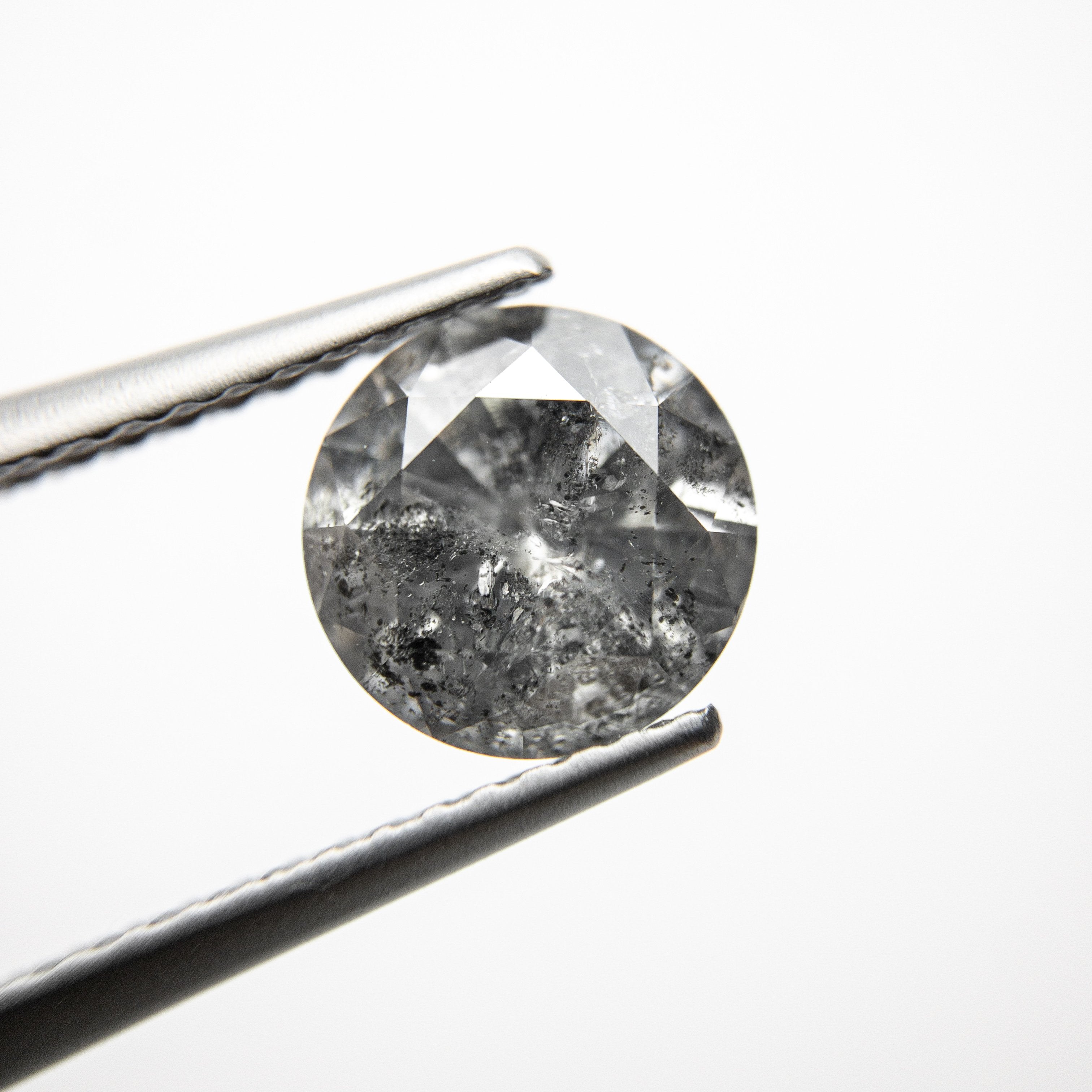 1.66ct 7.55x7.50x4.61mm Round Brilliant 18309-10 hold D1145
