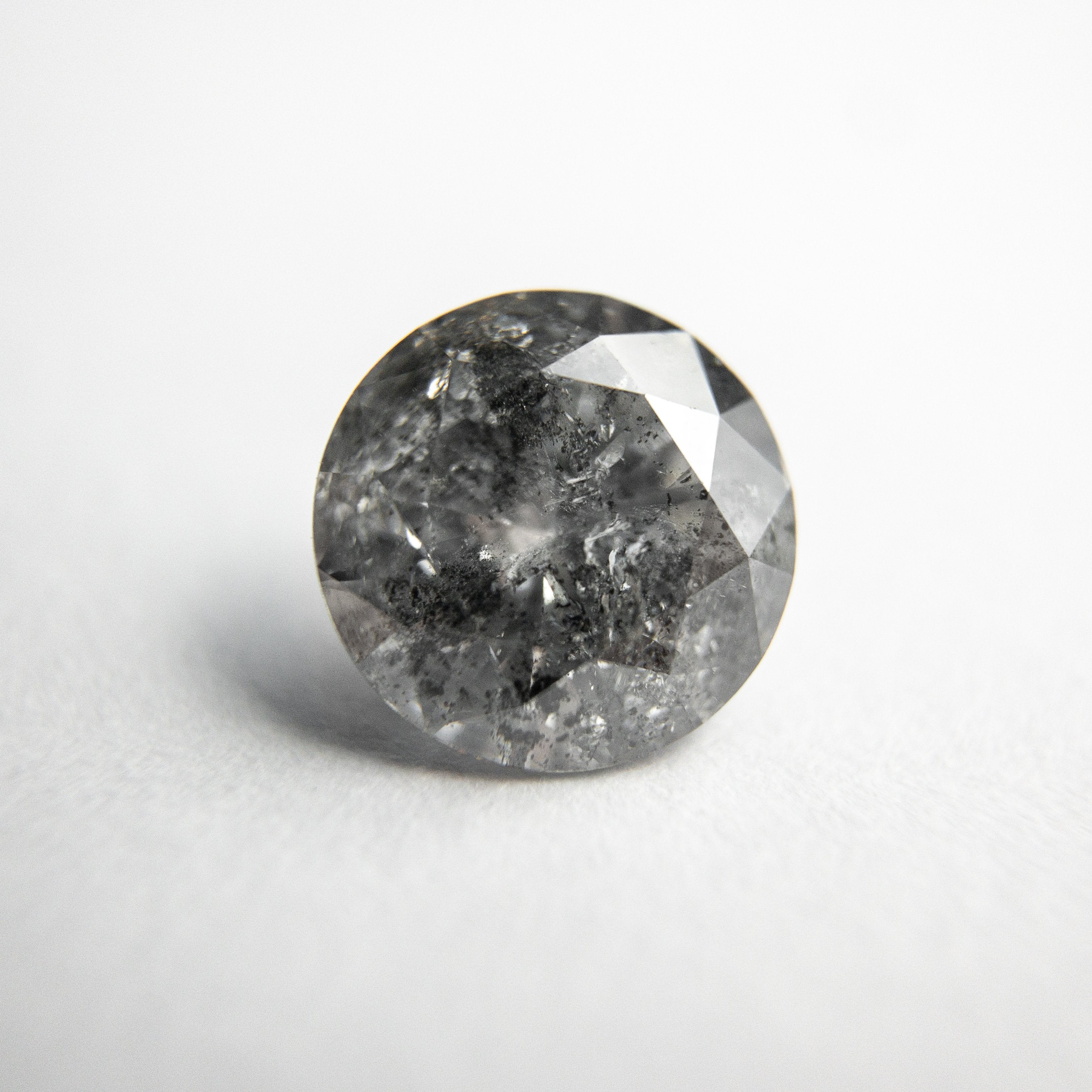 1.66ct 7.55x7.50x4.61mm Round Brilliant 18309-10 hold D1145