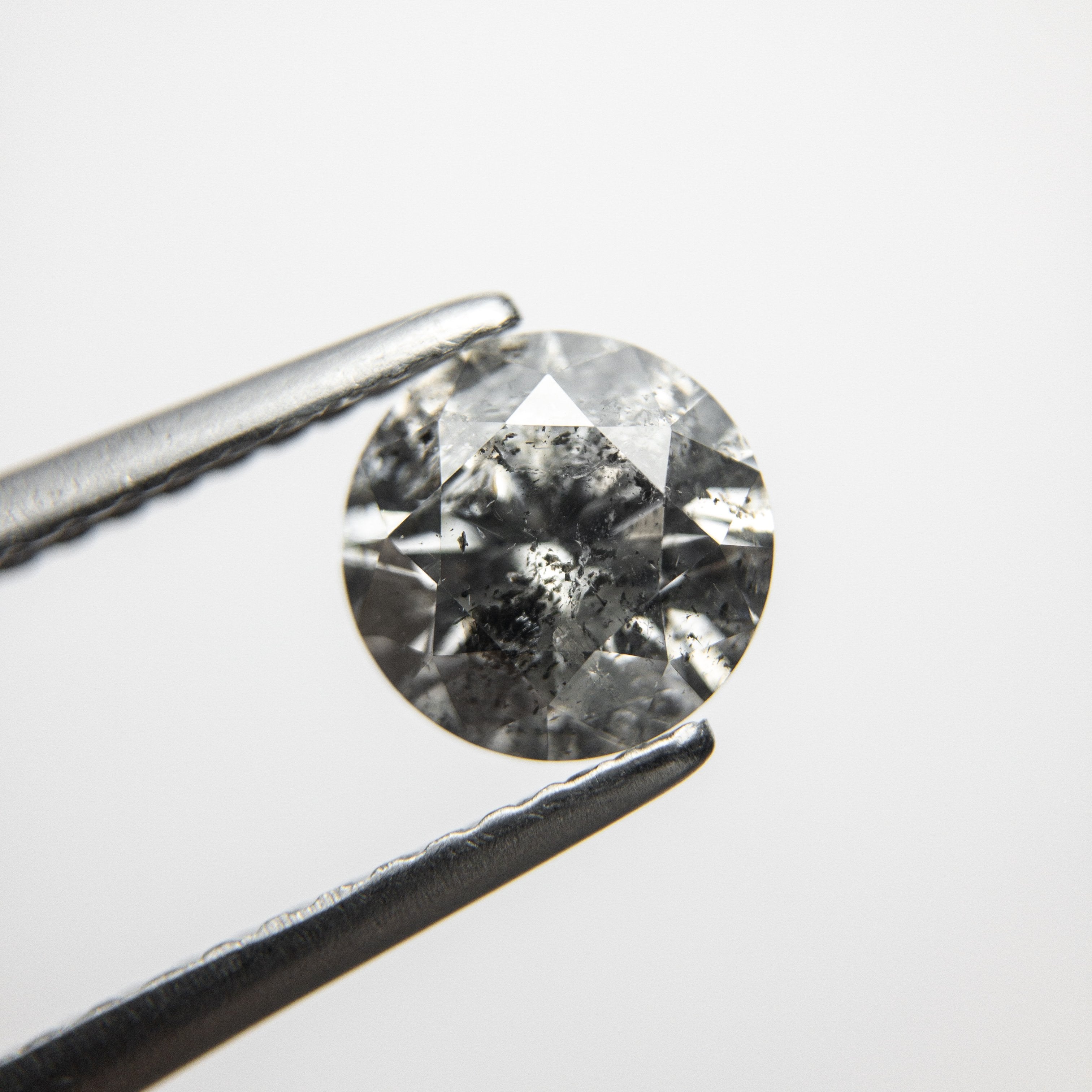 1.15ct 6.56x6.49x4.21mm Round Brilliant 18310-05 hold