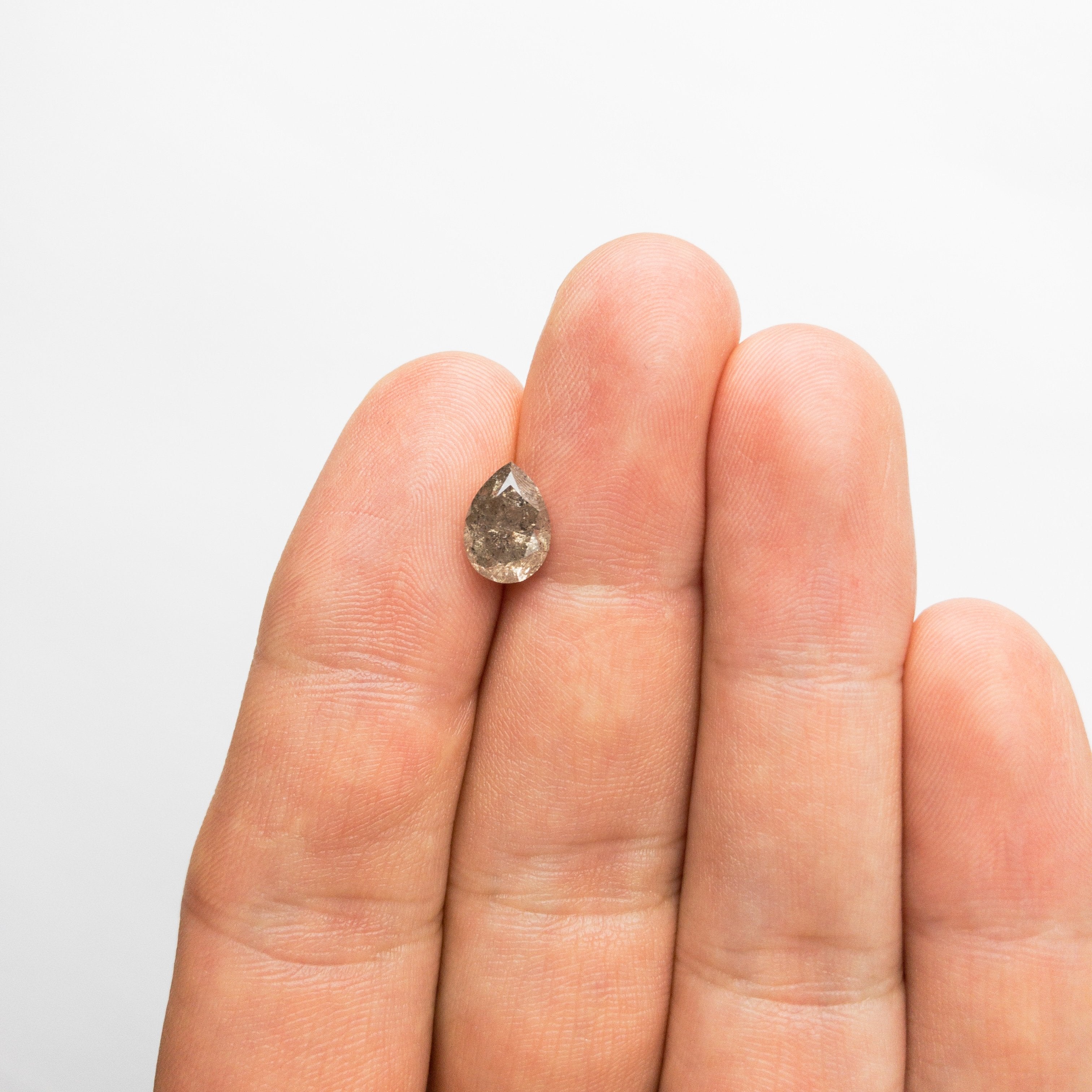 2.21ct 9.57x6.81x5.30mm Pear Brilliant Cut 18316-01 hold D1285