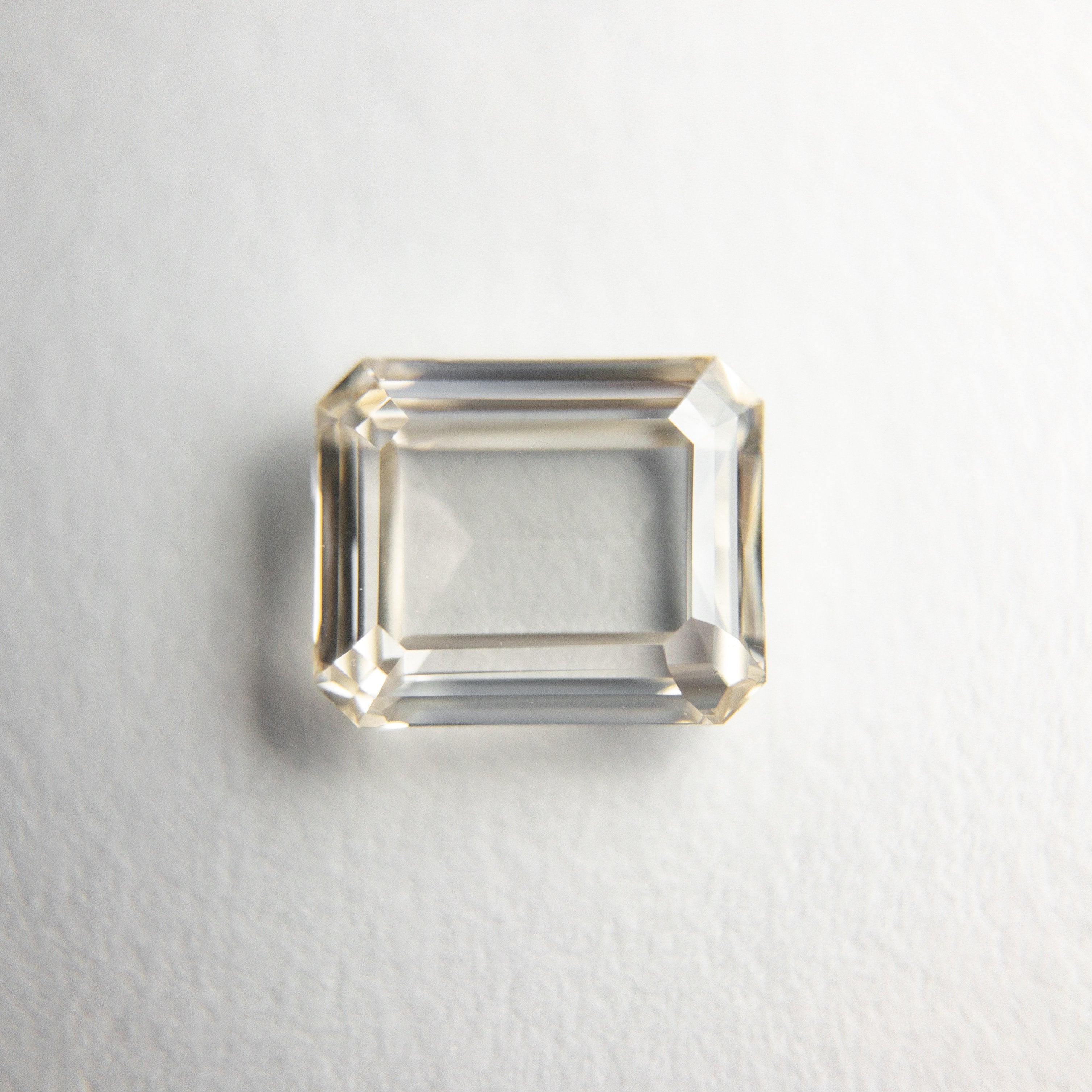1.00ct 6.57x5.43x2.28mm VVS2 Champagne Cut Corner Rectangle Step Cut 18328-01 Hold D1300