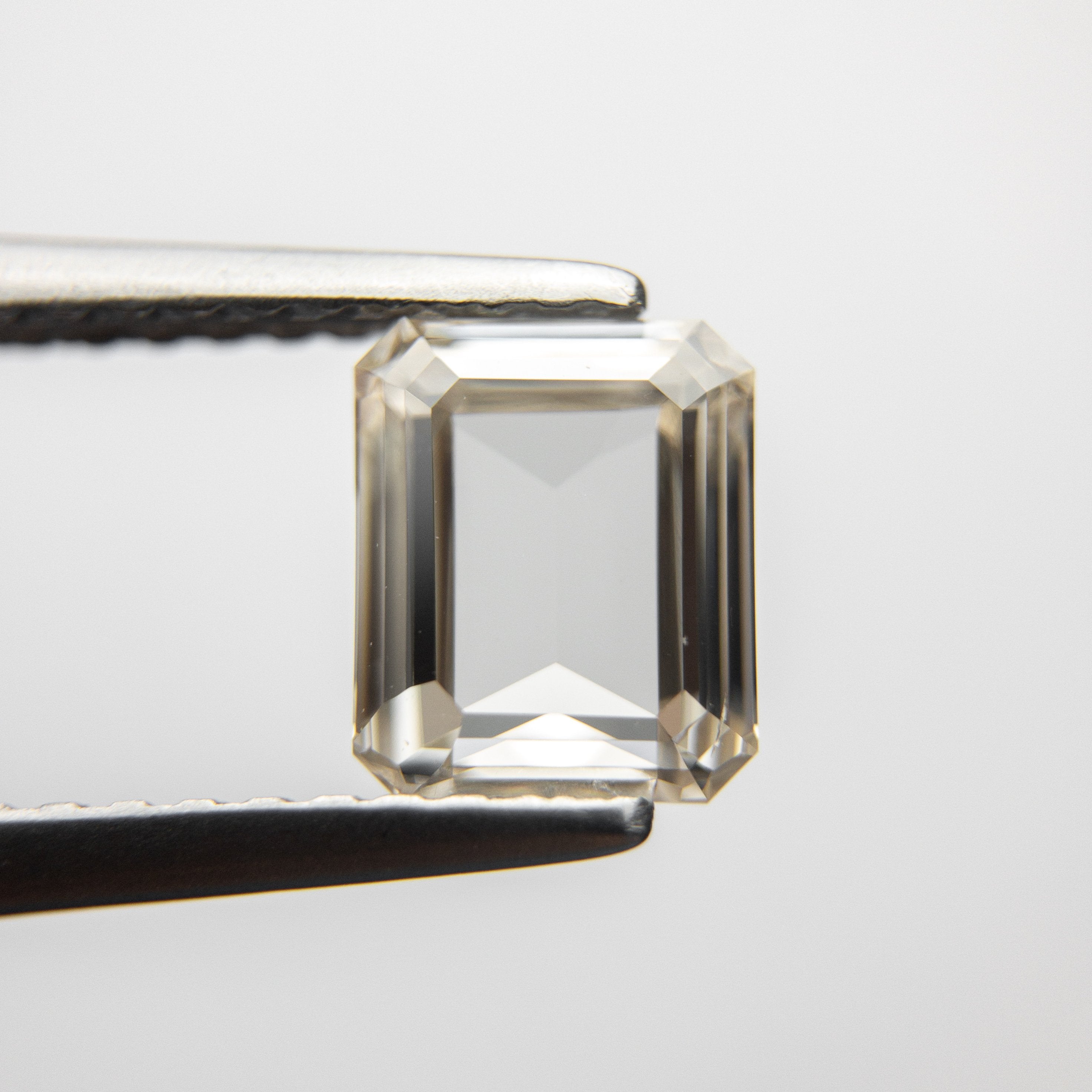 1.00ct 6.57x5.43x2.28mm VVS2 Champagne Cut Corner Rectangle Step Cut 18328-01 Hold D1300