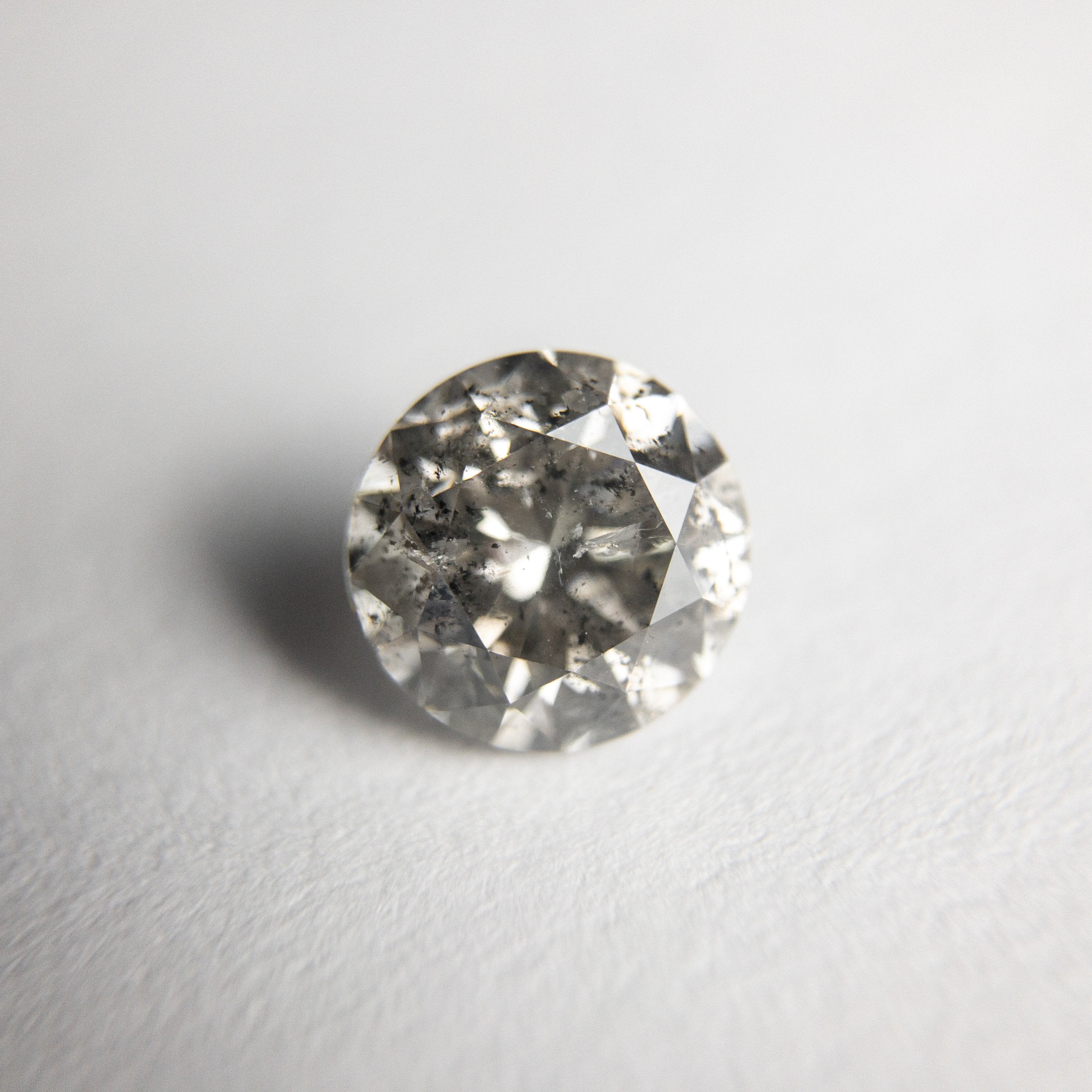1.02ct 6.08x6.13x4.13mm Round Brilliant 18354-04 hold D1319