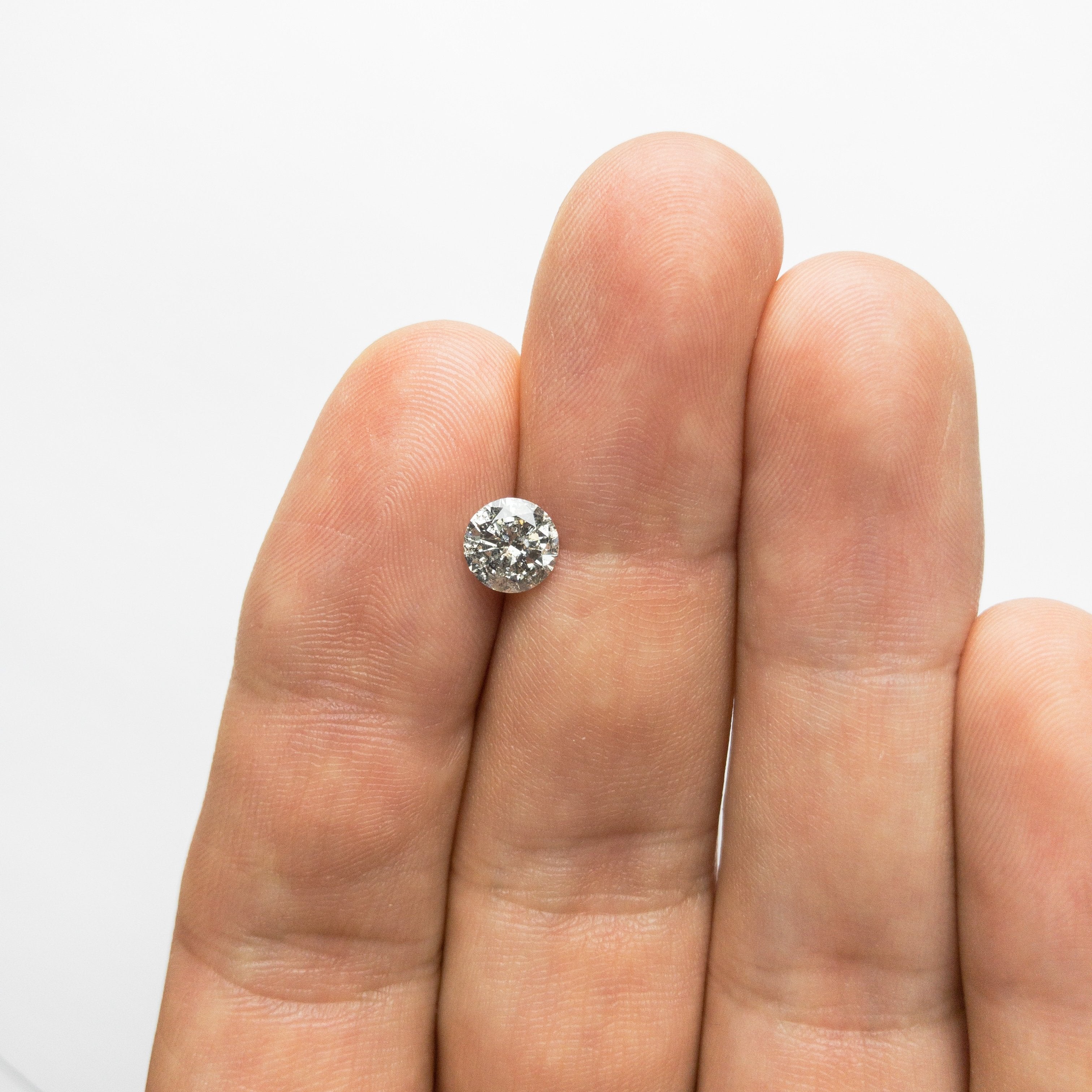 1.07ct 6.50x6.48x3.88mm Round Brilliant 18354-06 hold D1319