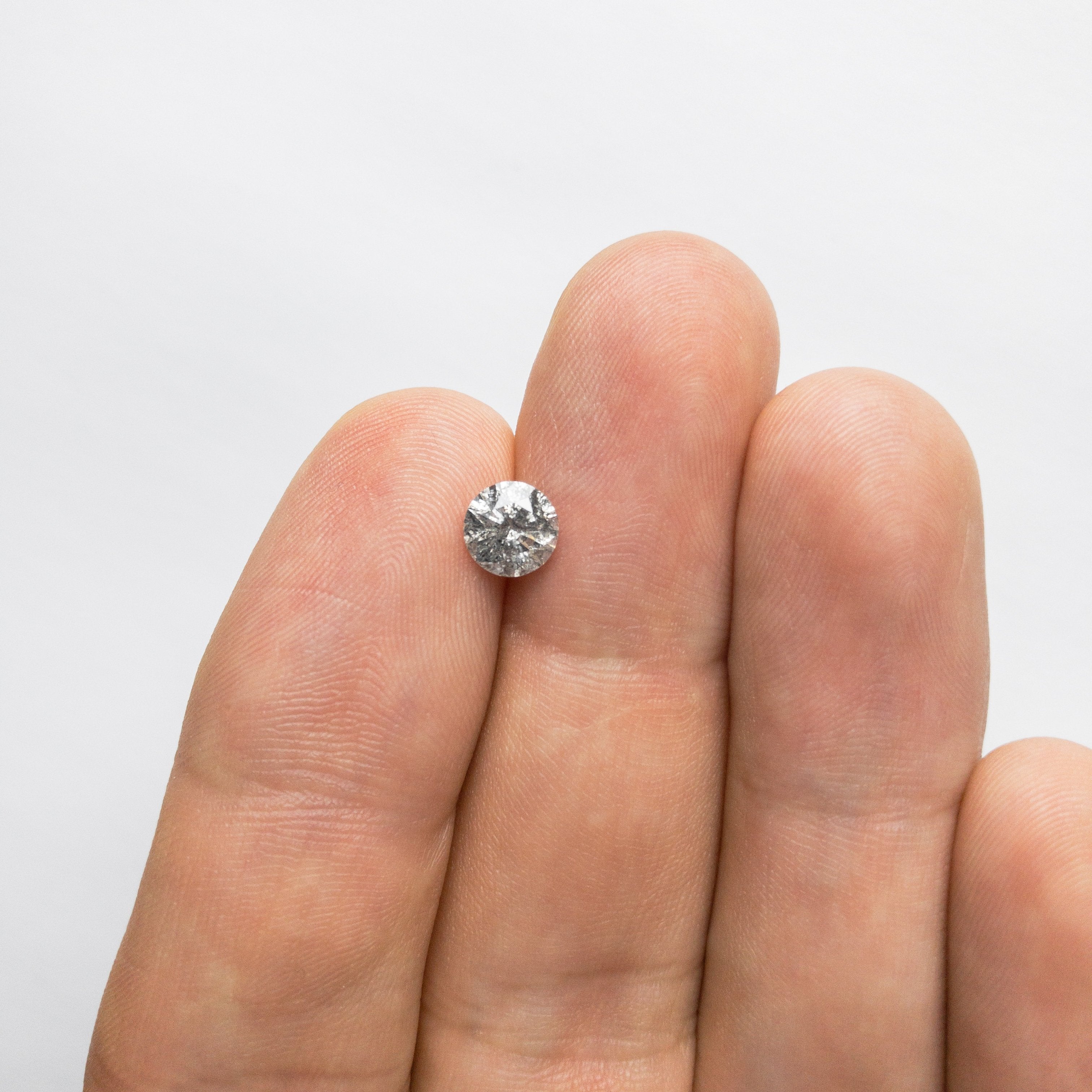 0.91ct 6.11x6.08x3.82mm Round Brilliant 18357-10 hold D1498