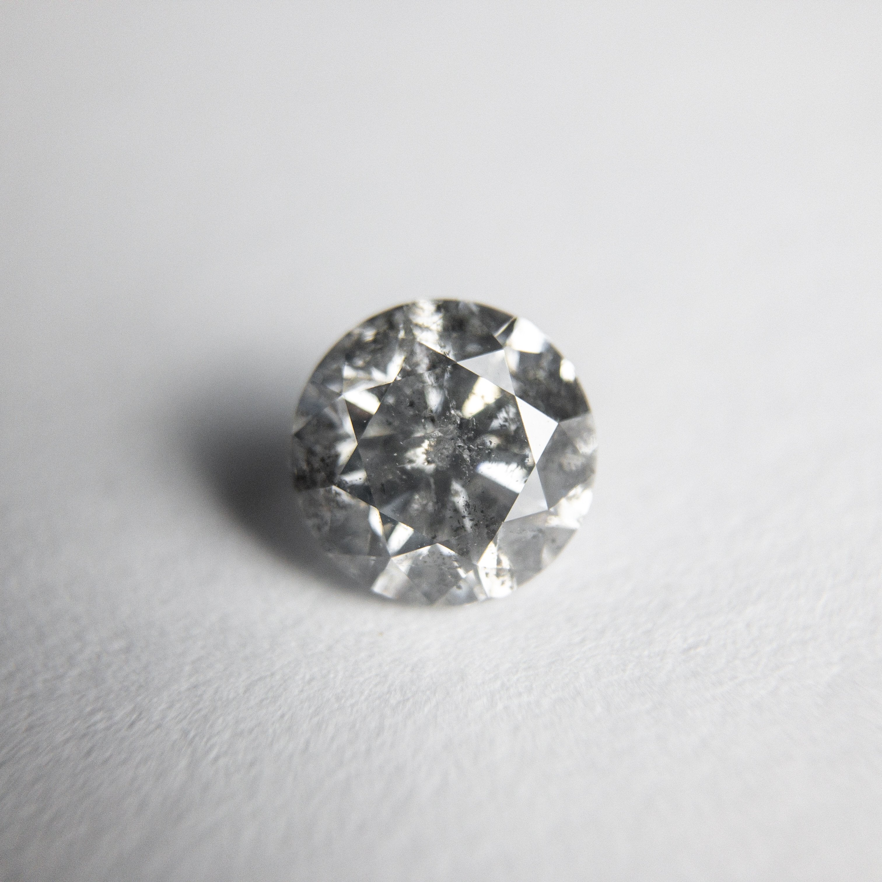 0.85ct 5.87x5.84x3.78mm Round Brilliant 18357-12 hold d1411