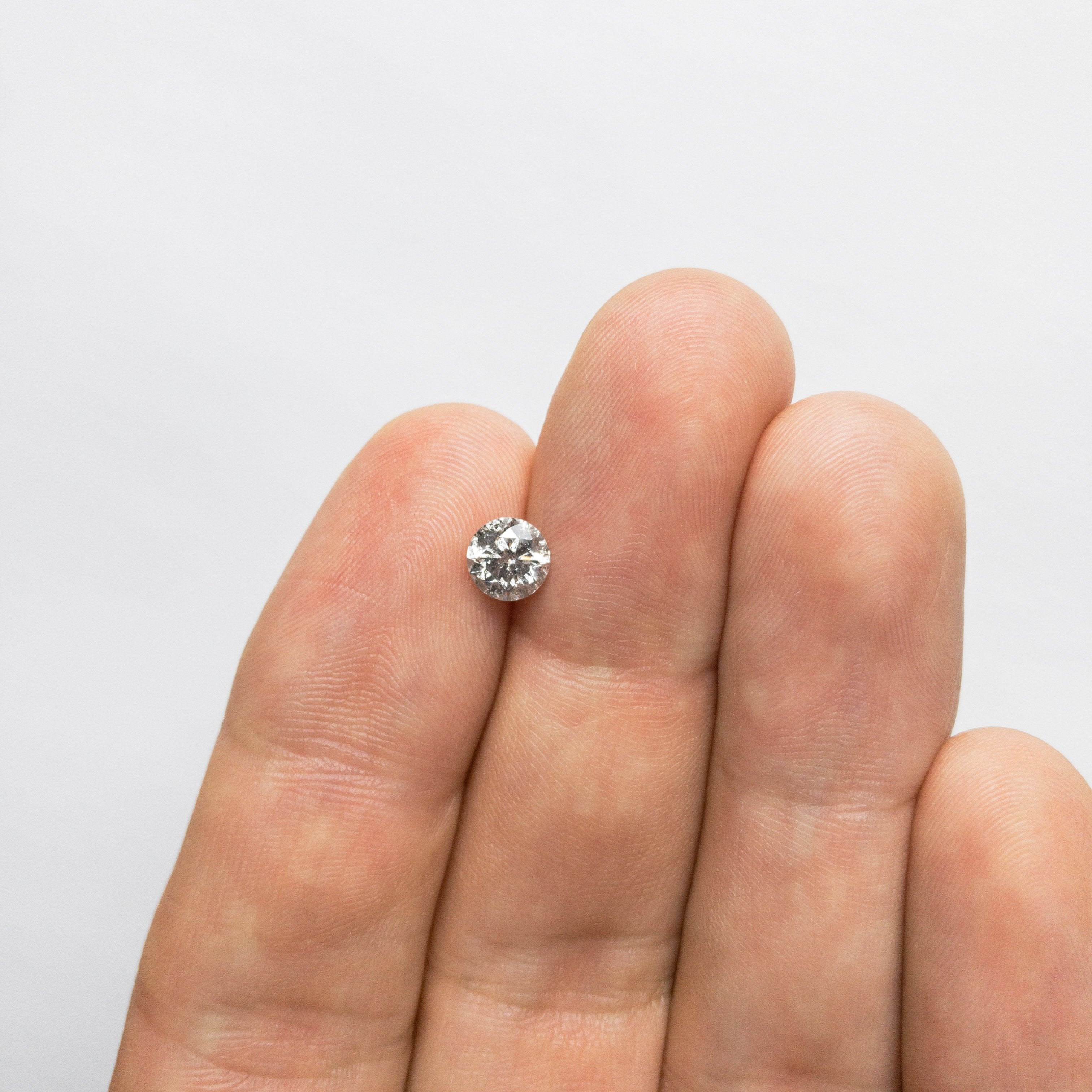 0.85ct 5.87x5.84x3.78mm Round Brilliant 18357-12 hold d1411