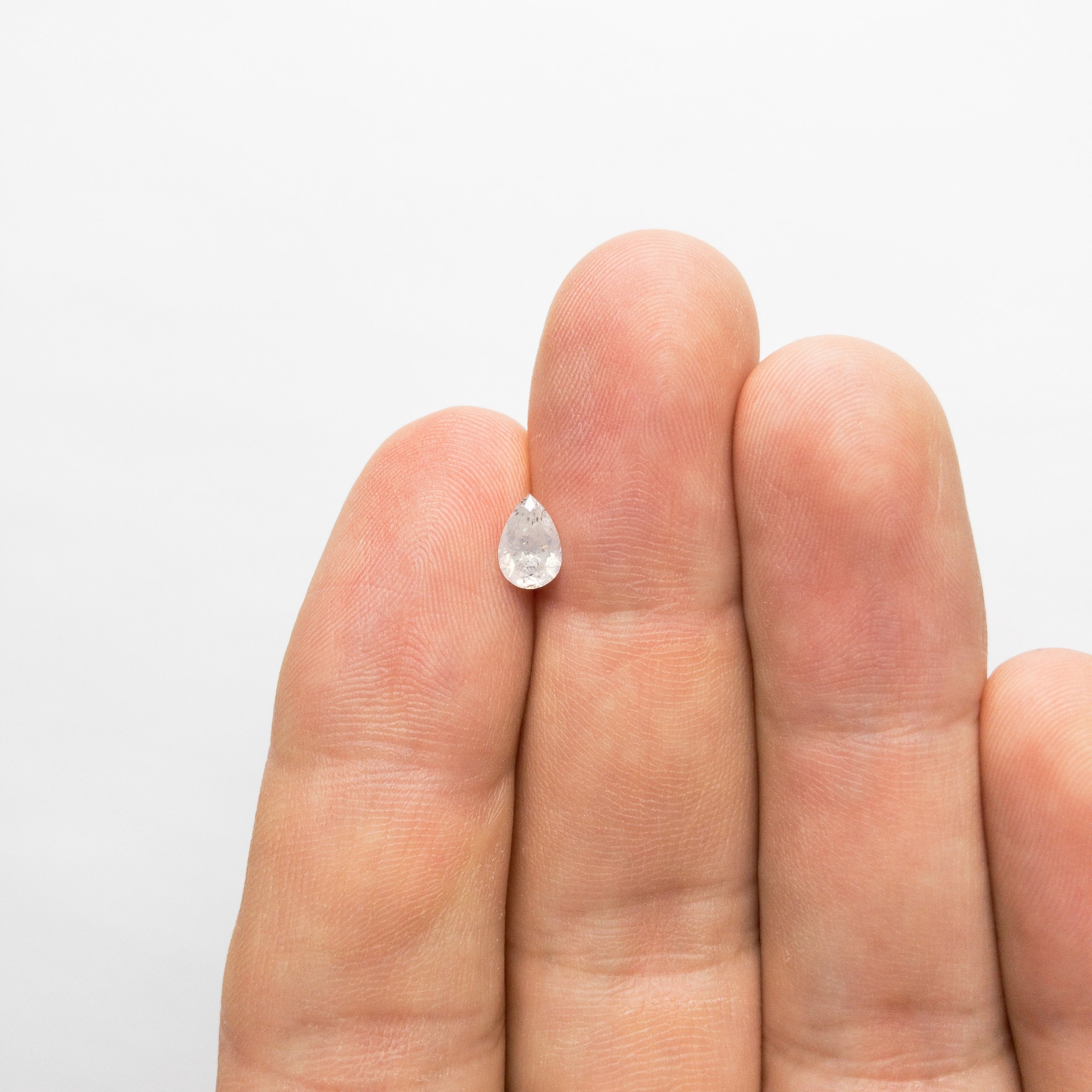 0.61ct 6.97x4.67x3.07mm Pear Brilliant 18361-02 Hold D1547