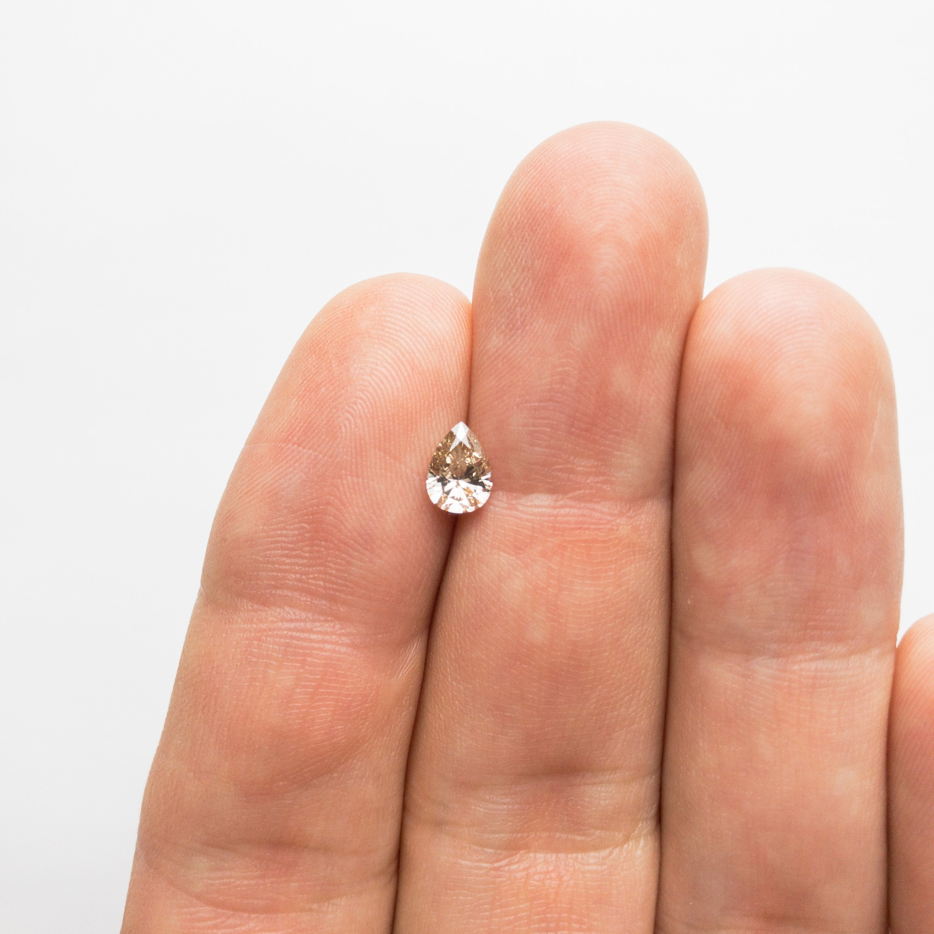 0.62ct 6.77x4.82x3.03mm Pear Brilliant 18369-32 HOLD D1630