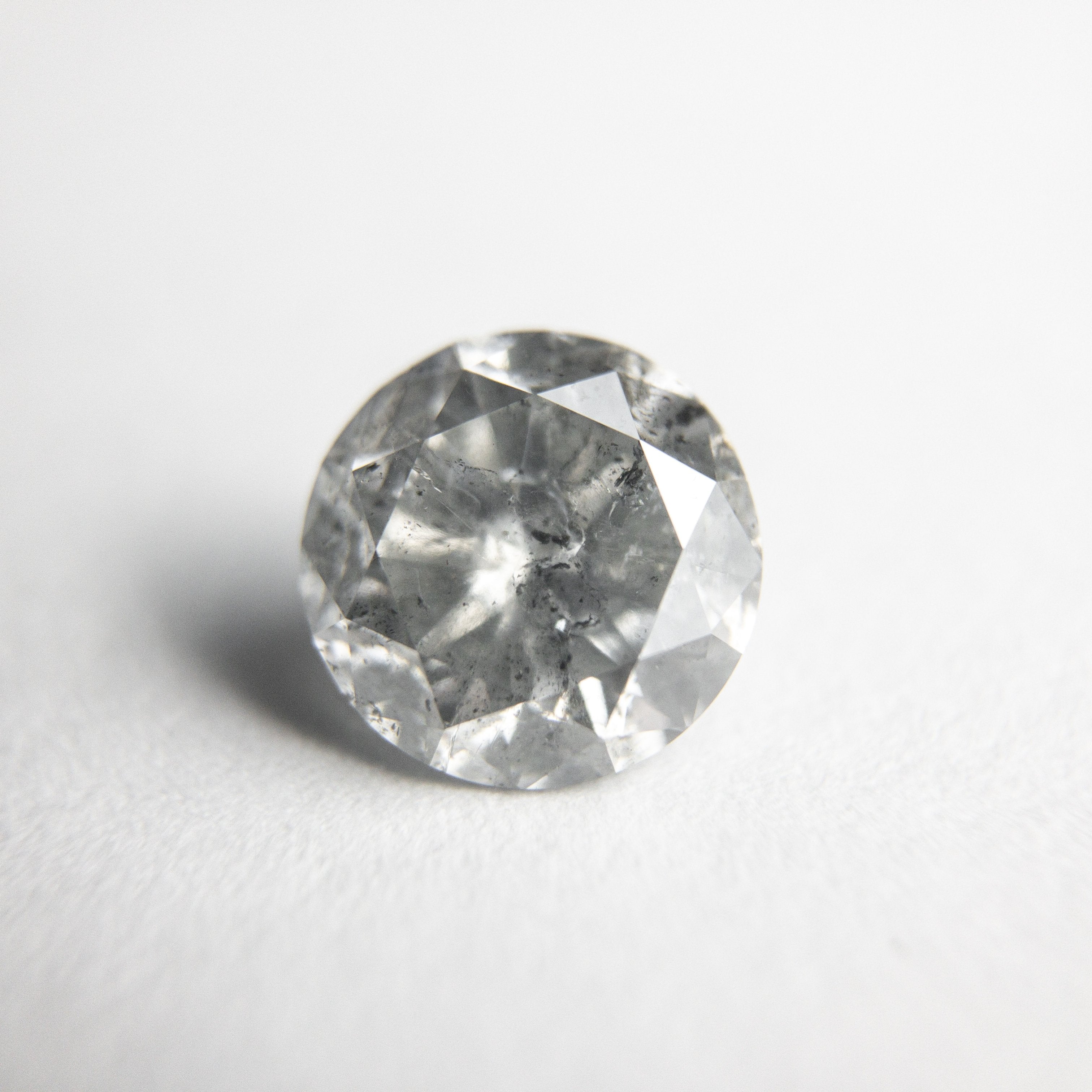 1.28ct 6.93x6.89x4.22mm Round Brilliant 18375-01 hold D1583