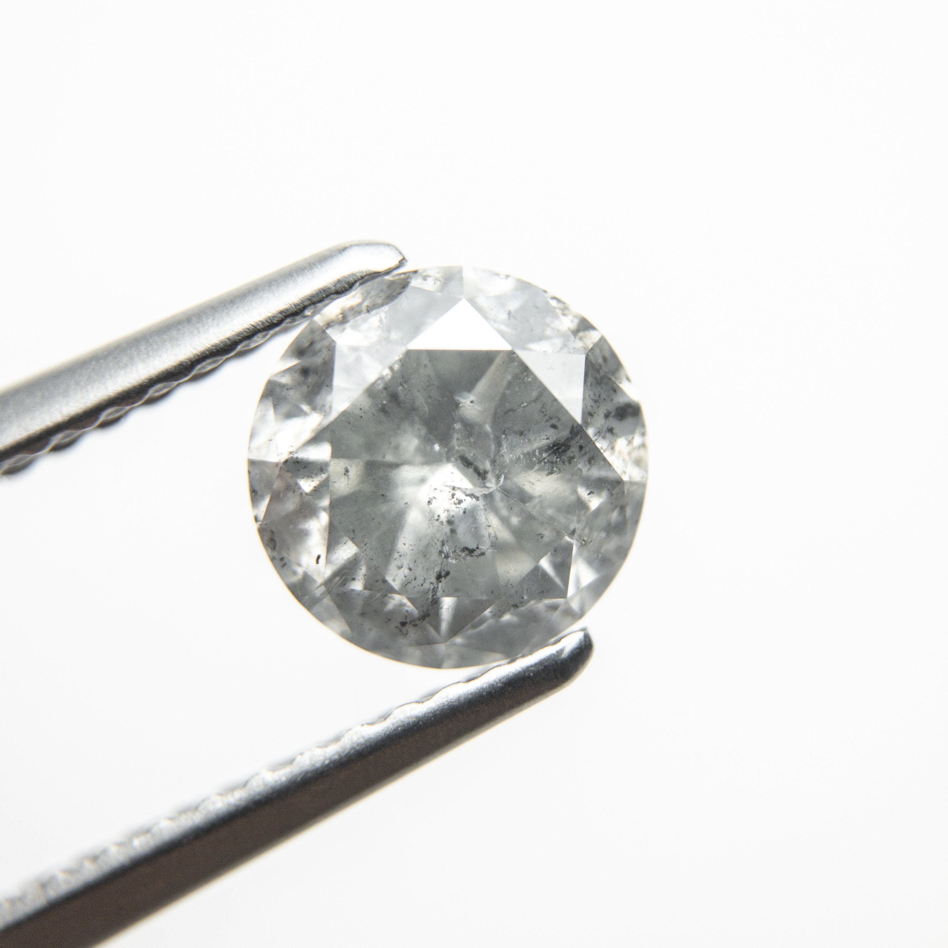 1.28ct 6.93x6.89x4.22mm Round Brilliant 18375-01 hold D1583