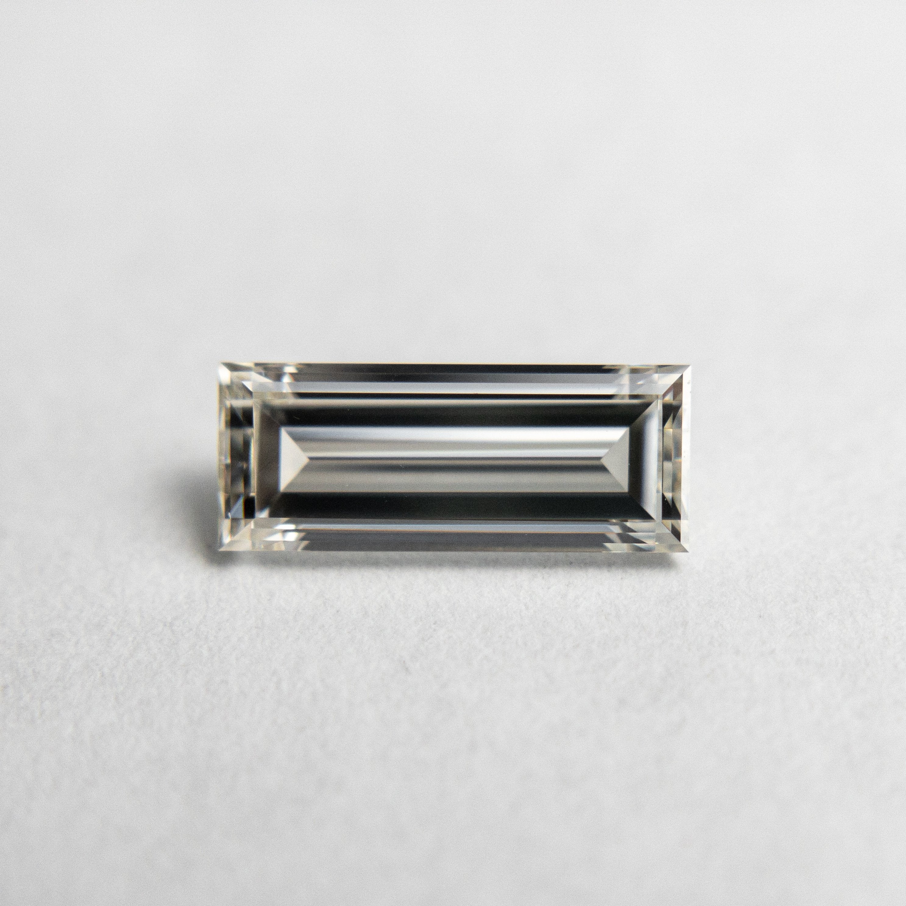 1.01ct 9.40x3.76x2.64mm GIA VS1 K Baguette 18389-01
