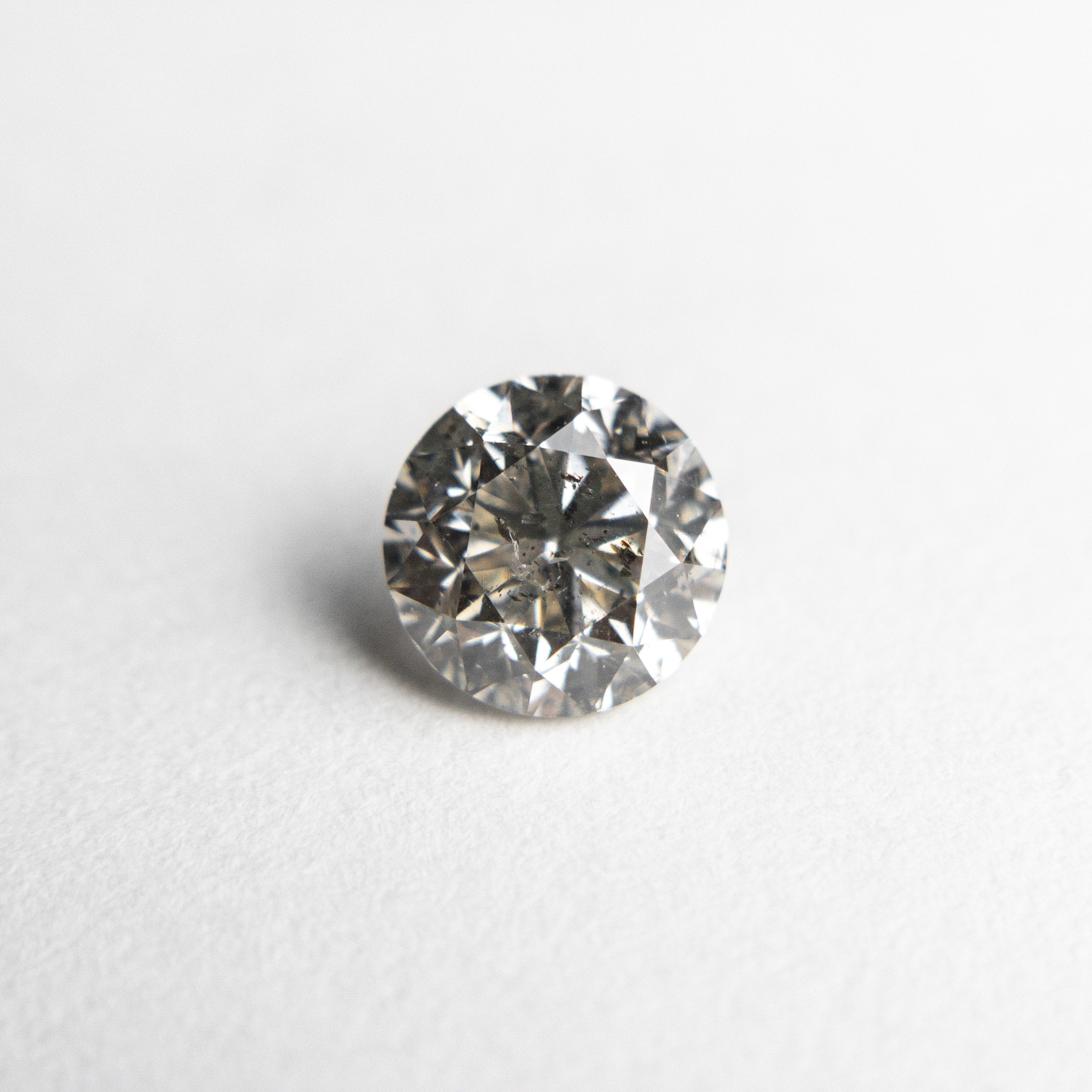 0.90ct 5.86x5.83x3.93mm Round Brilliant 18411-04 hold D1822