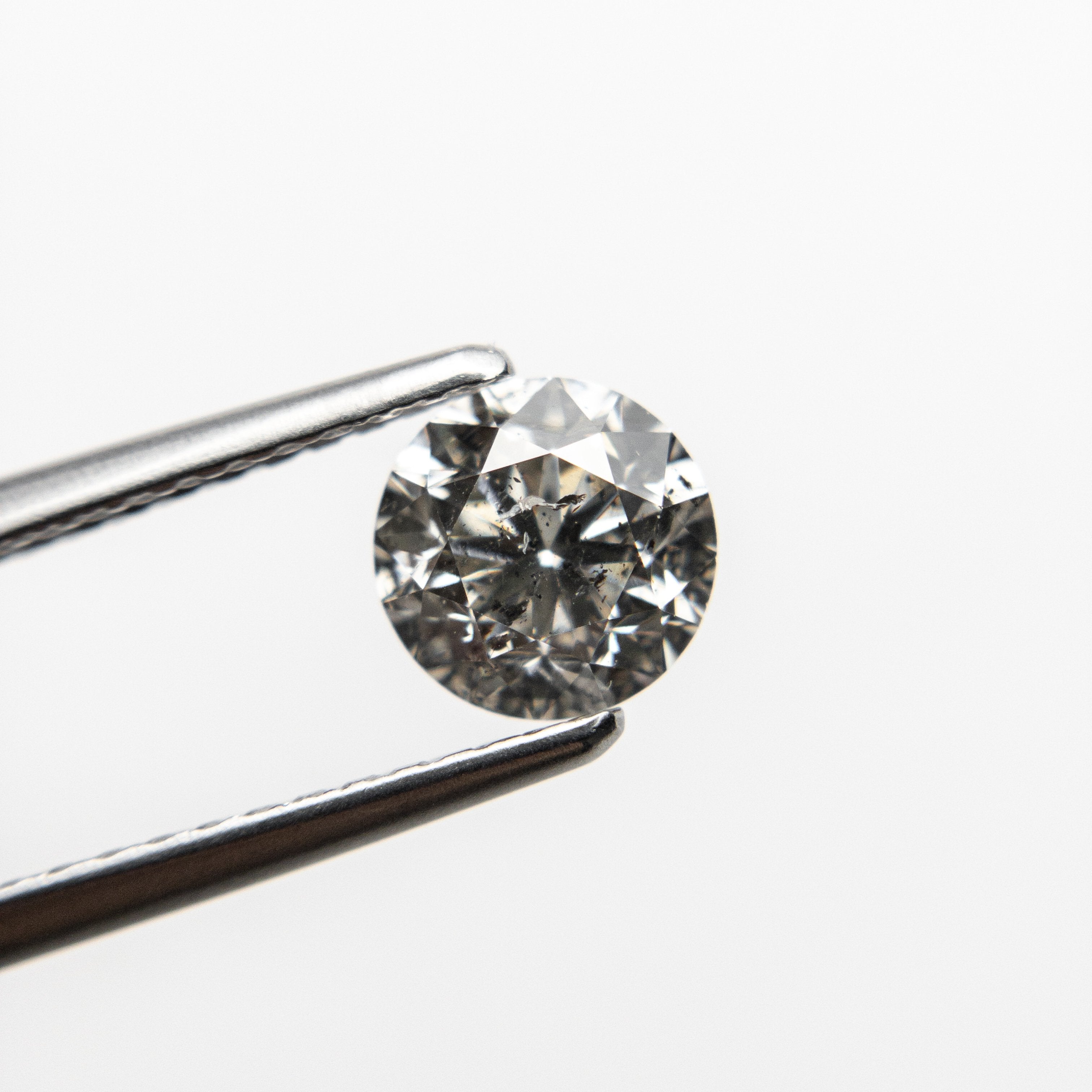 0.90ct 5.86x5.83x3.93mm Round Brilliant 18411-04 hold D1822