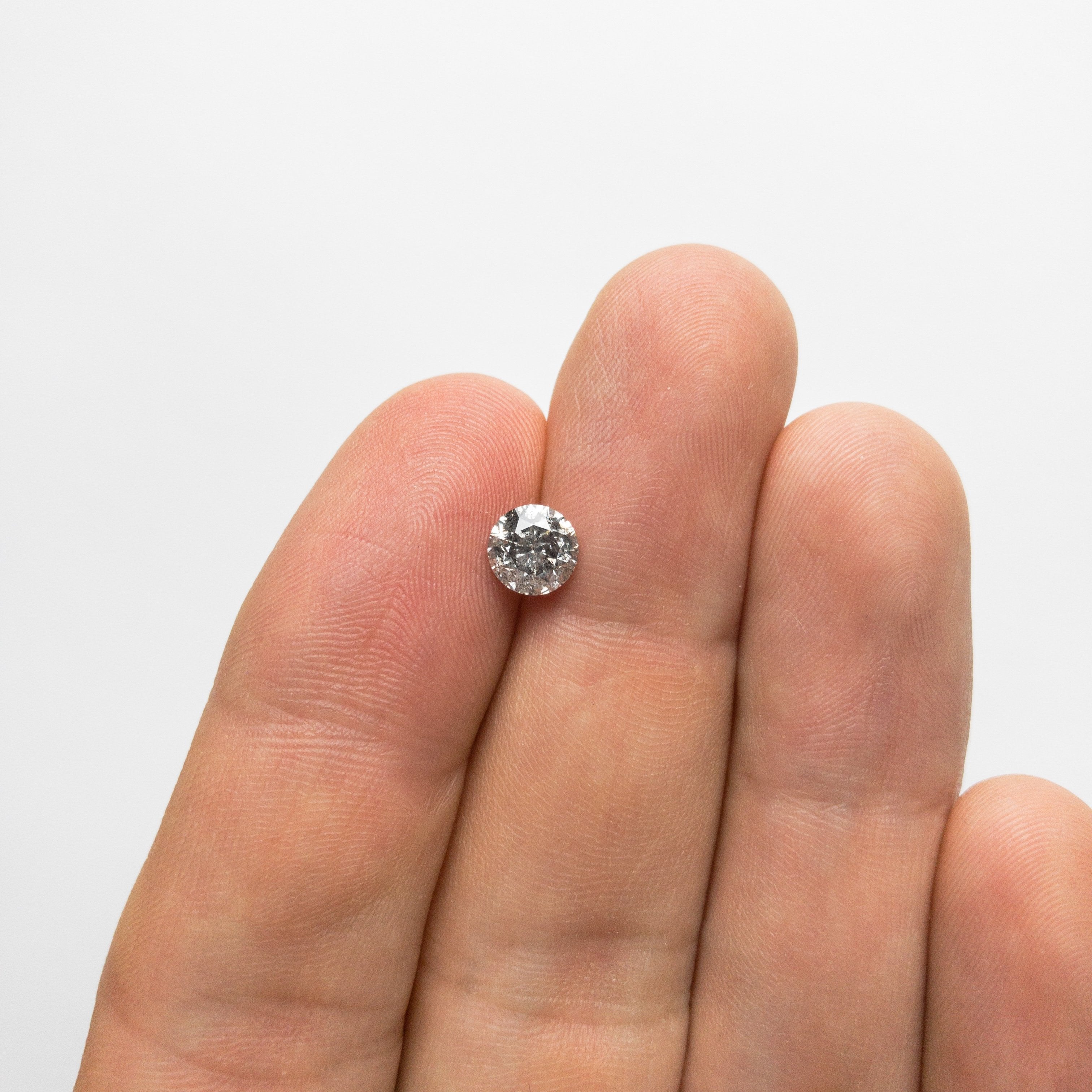 1.07ct 6.24x6.18x4.25mm Round Brilliant 18427-07 hold D1515