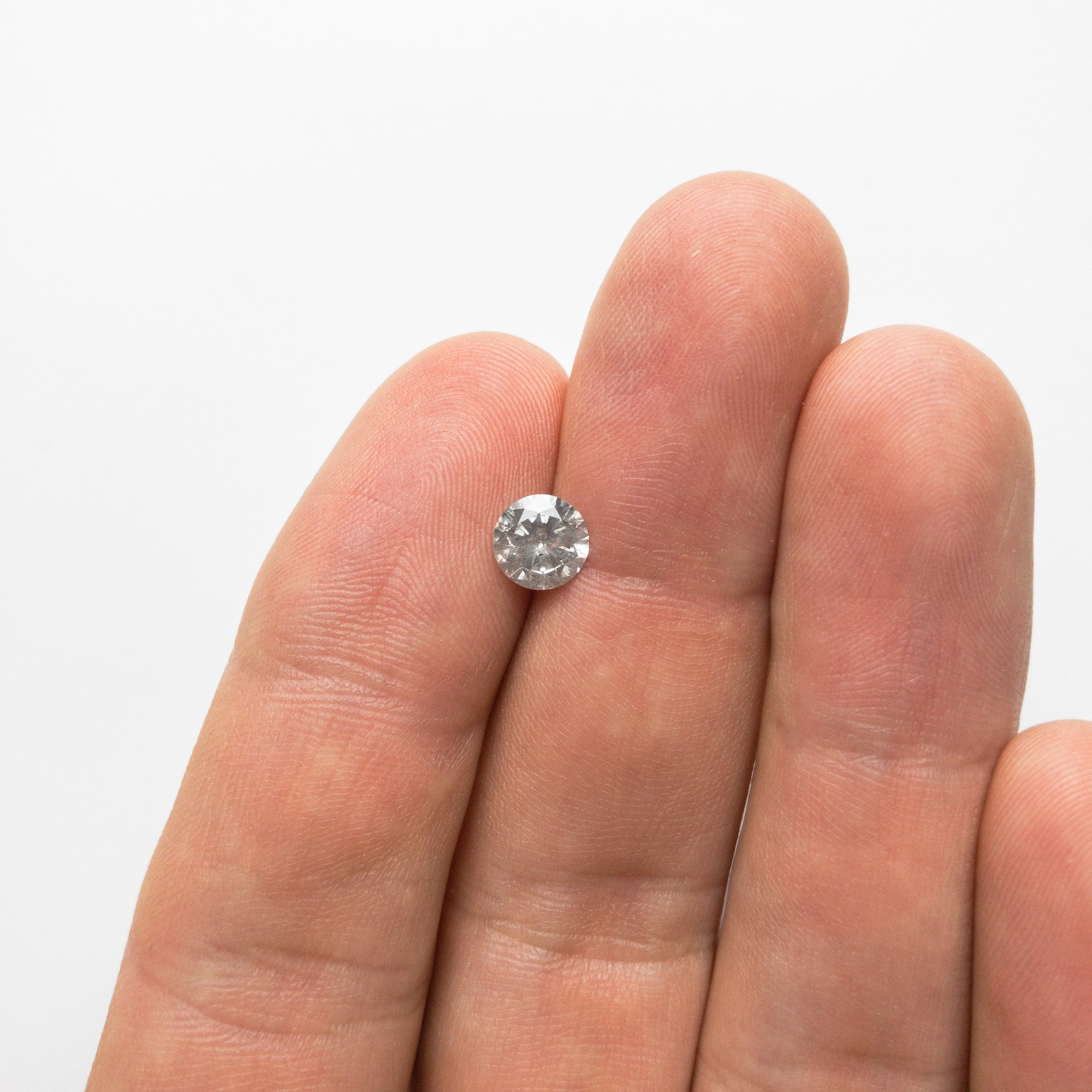 0.97ct 6.50x6.48x3.64mm Round Brilliant 18428-01 hold D1547