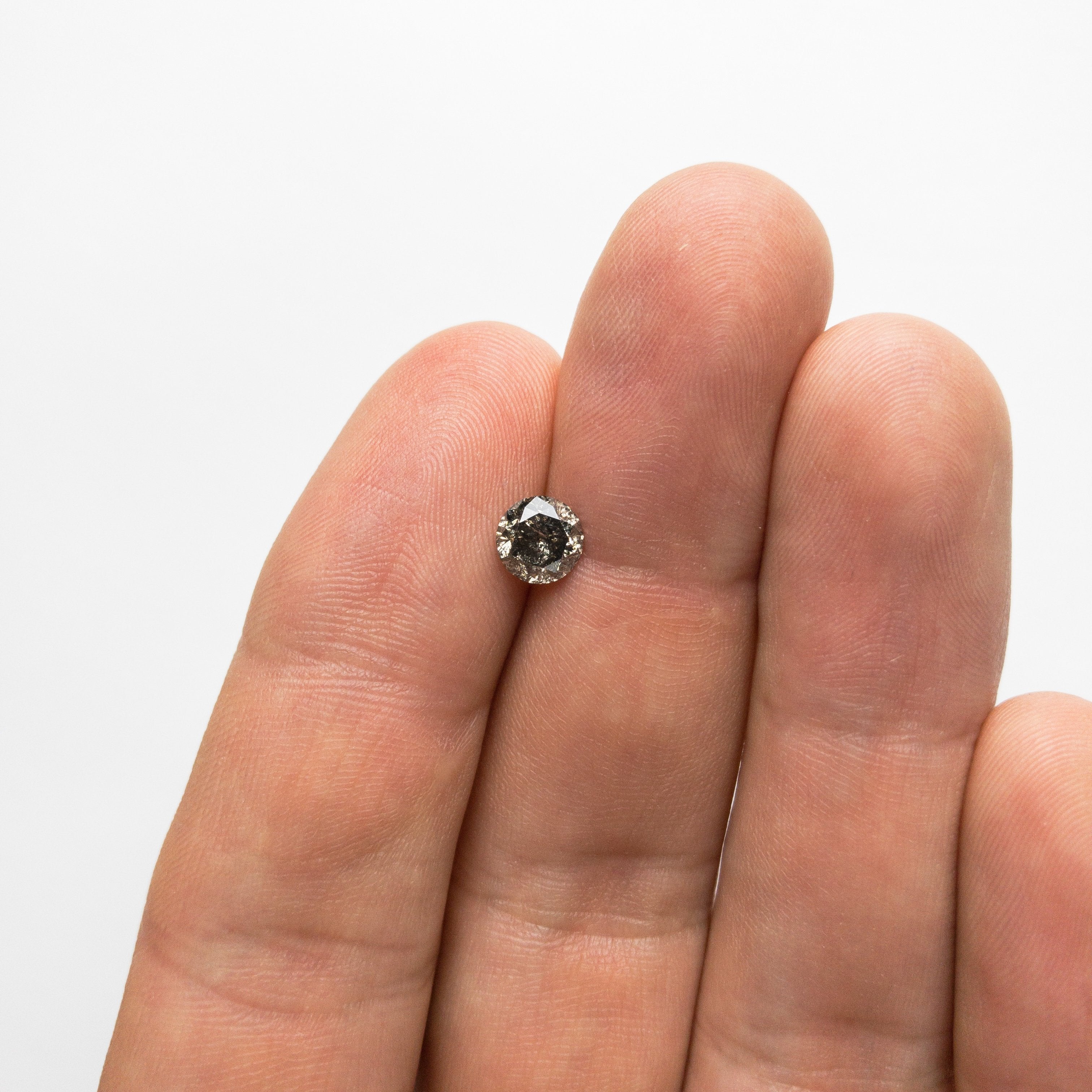 0.98ct 6.04x6.02x4.05mm Round Brilliant 18428-02 hold d1711