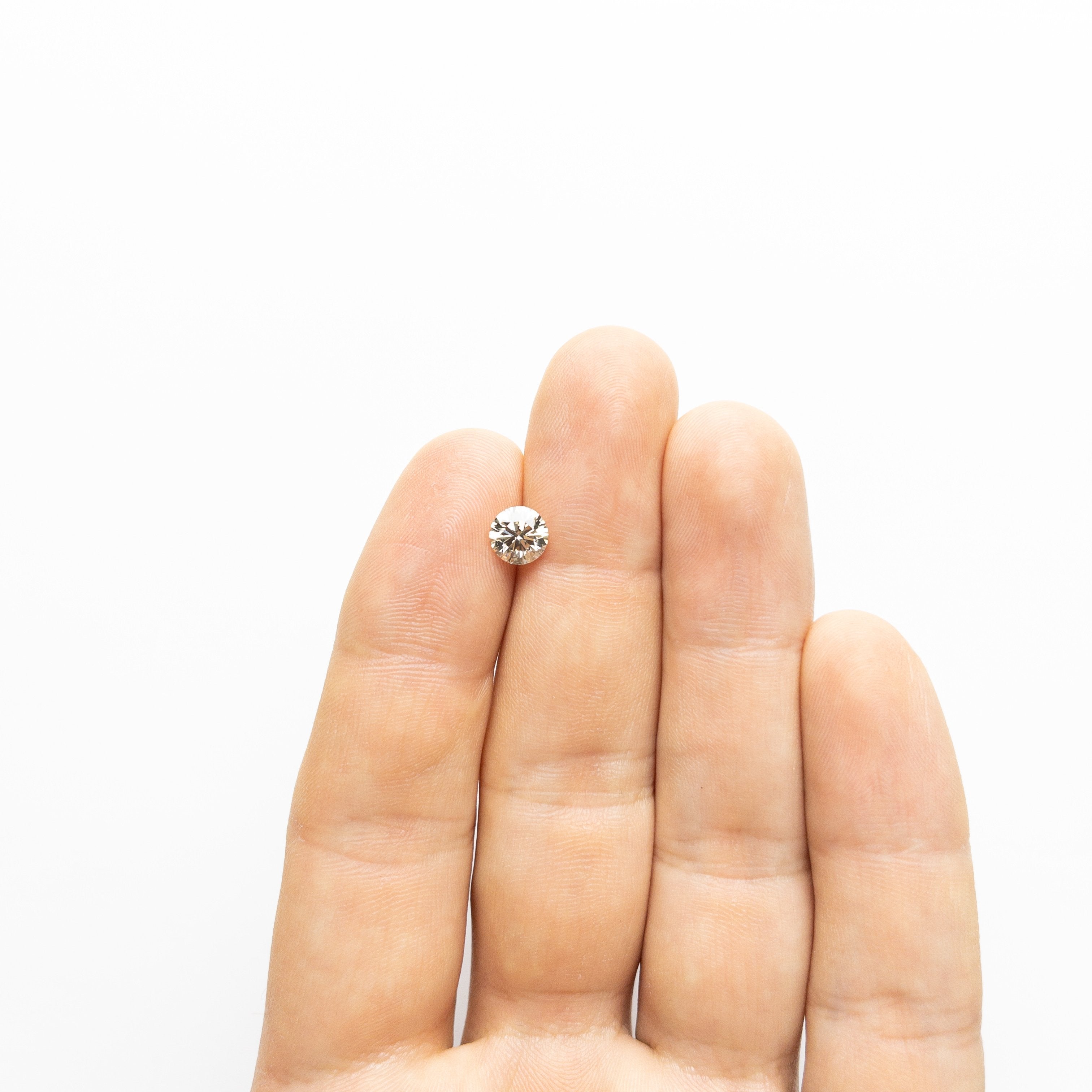 1.09ct 6.57x6.53x4.10mm VS Champagne Round Brilliant 18438-02