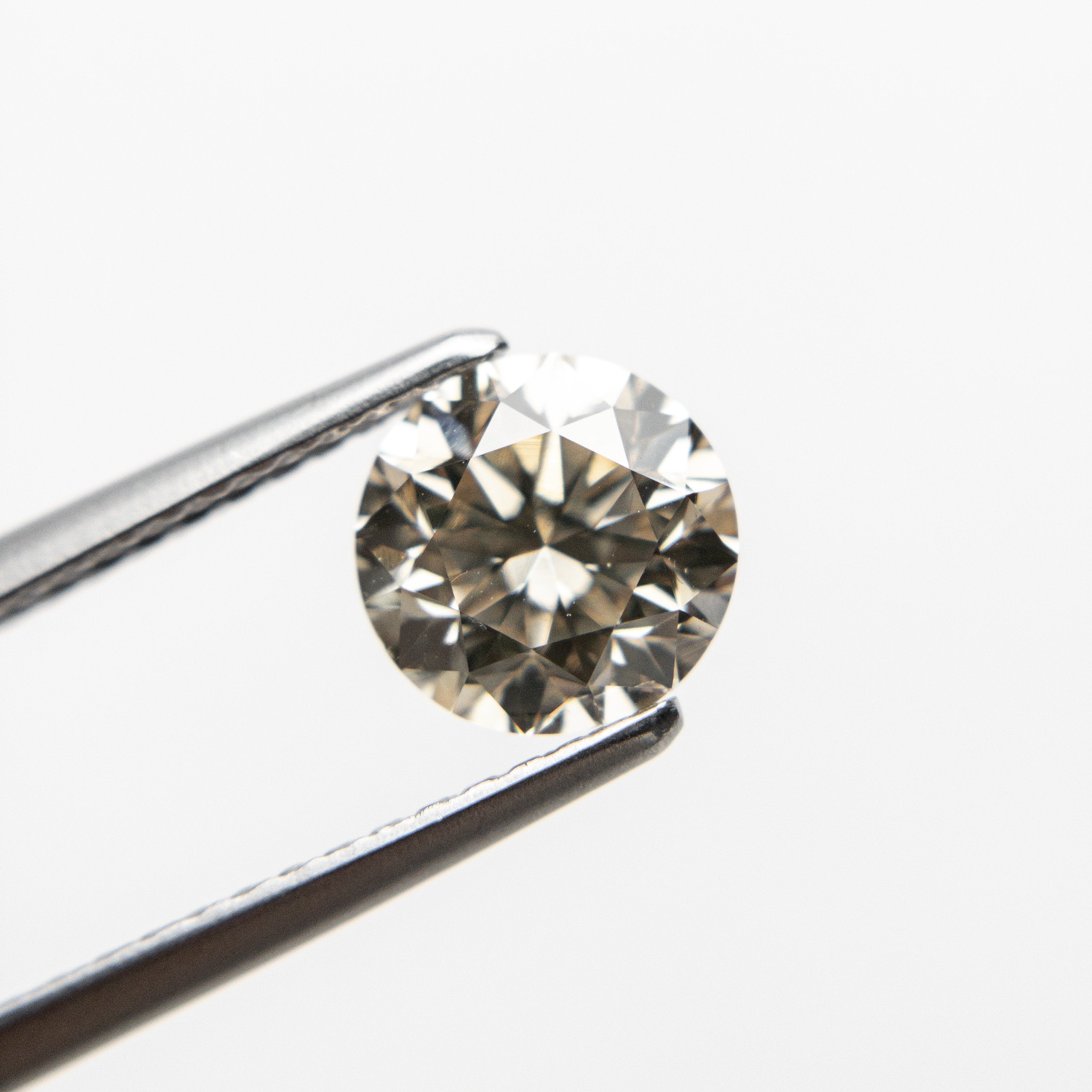 1.21ct 6.50x6.43x4.42mm VS Champagne Round Brilliant 18438-06