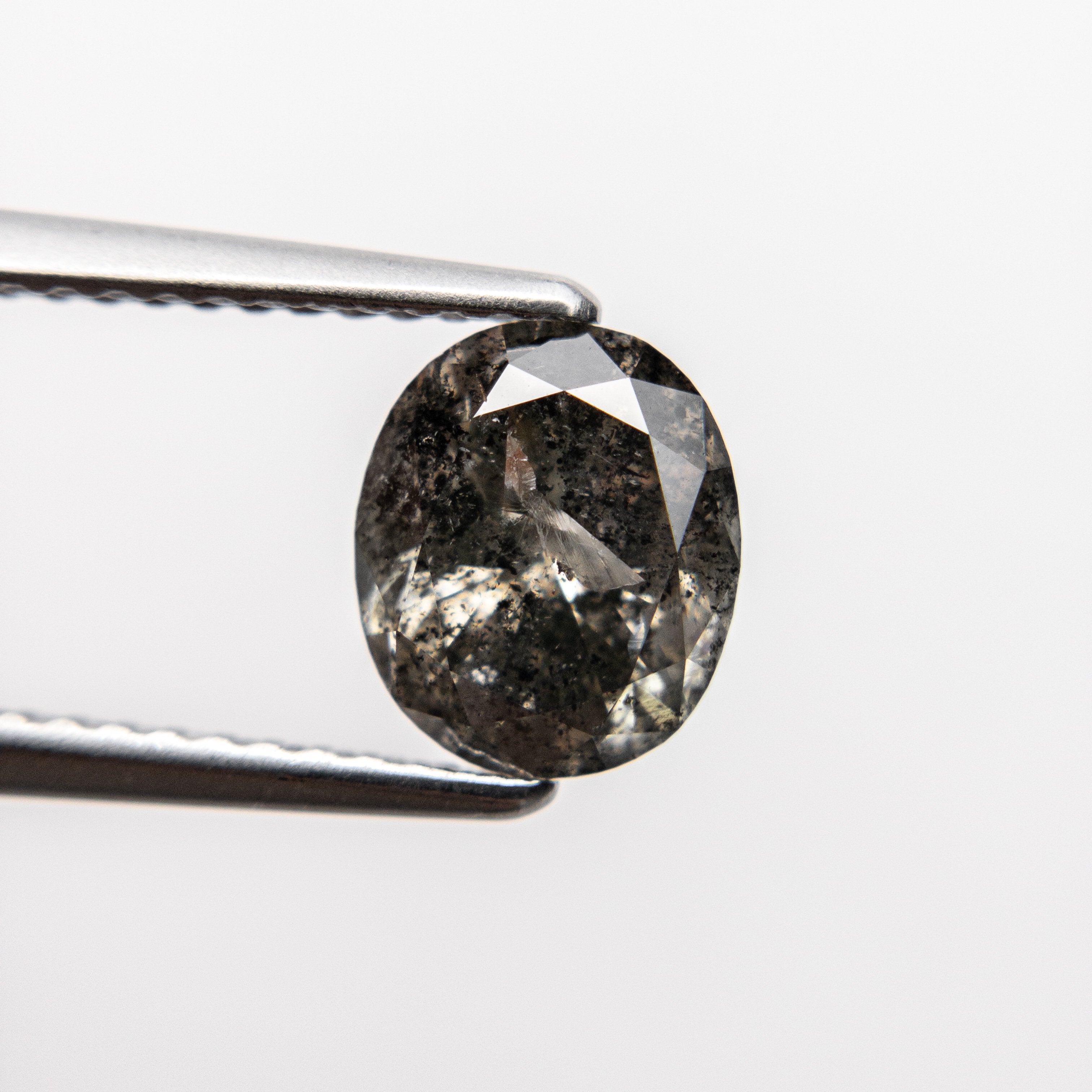 1.63ct 7.82x6.64x4.56mm Oval Brilliant 18453-18 hold D2020