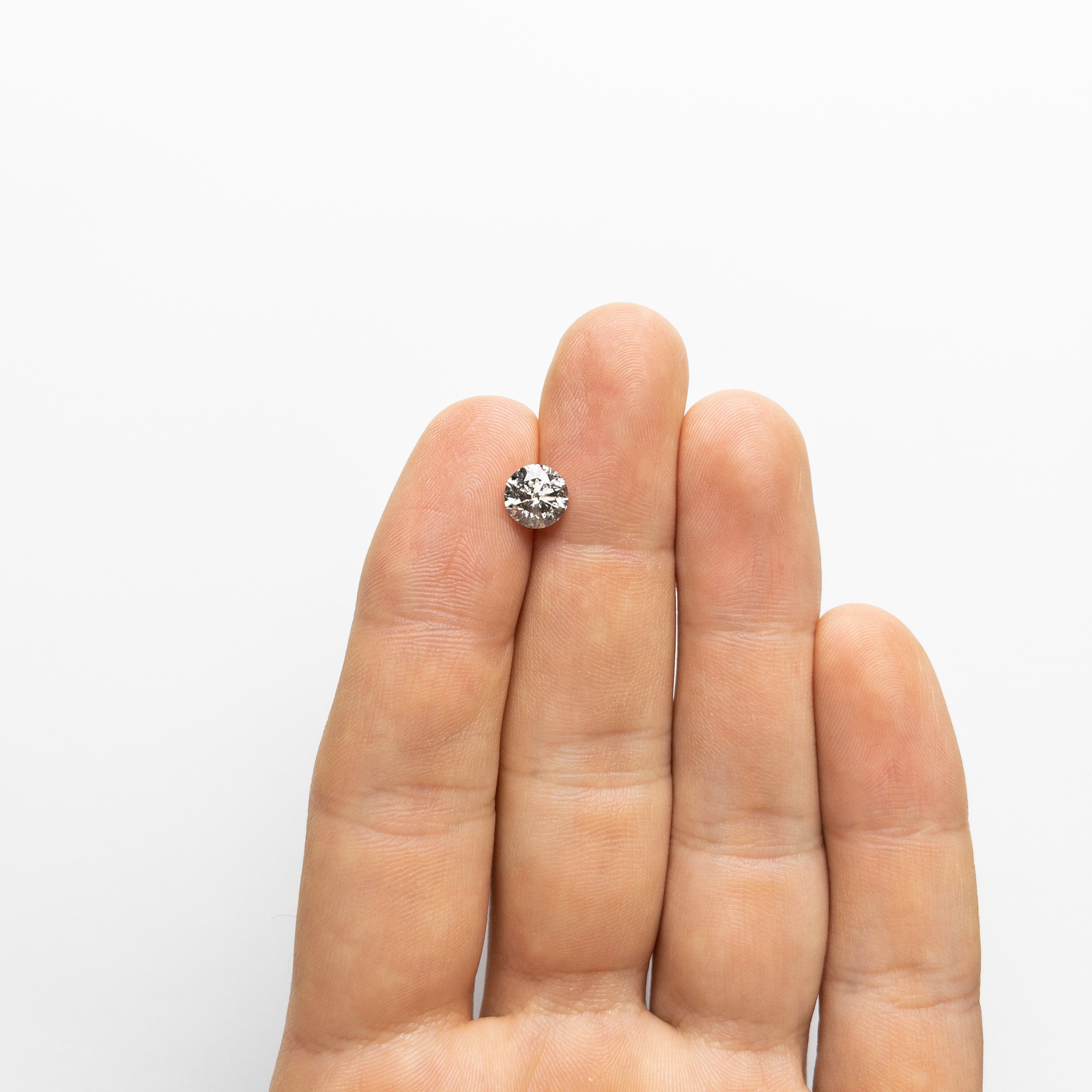 1.51ct 7.09x7.03x4.50mm Round Brilliant 18459-02 Hold D1688