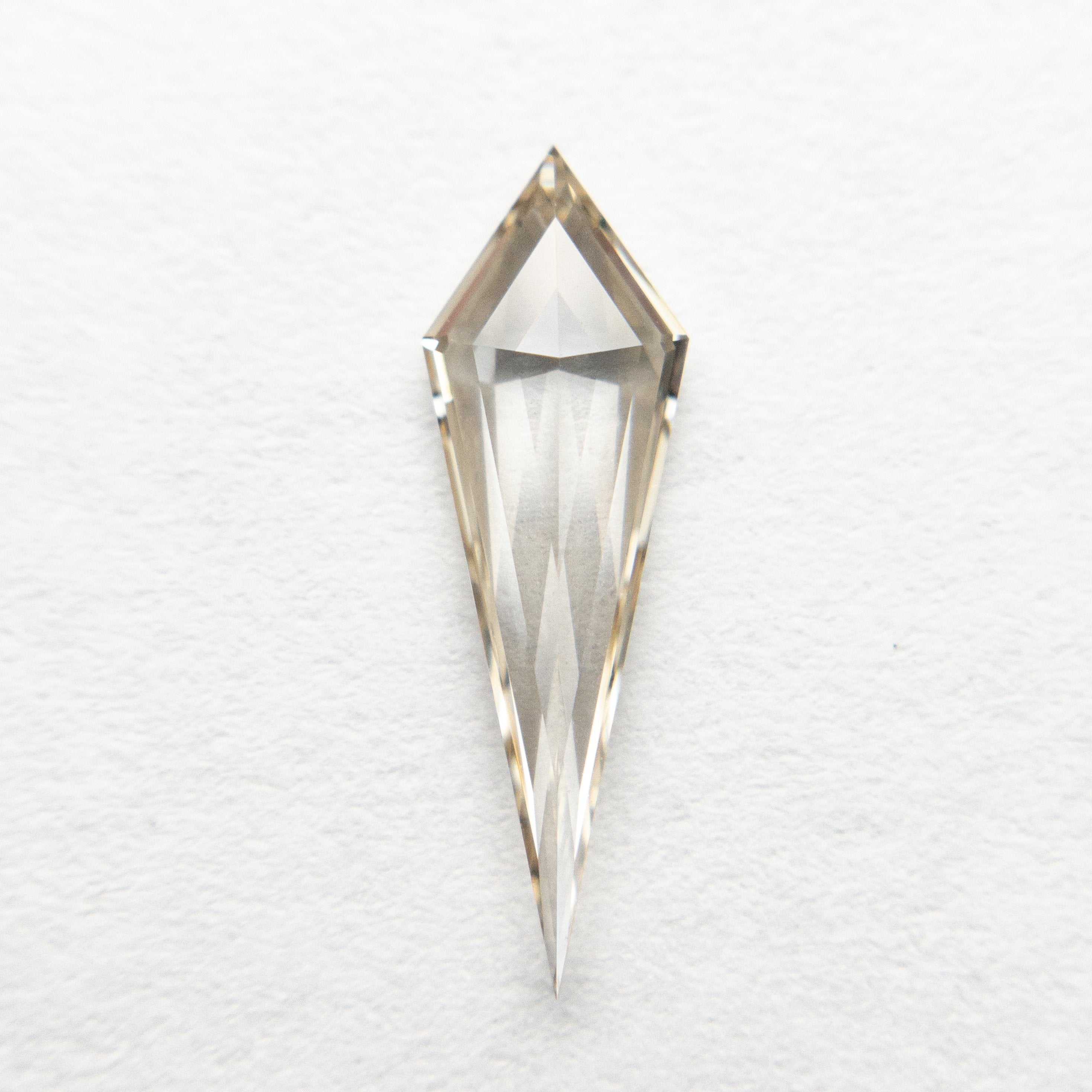 0.58ct 13.83x4.36x1.91mm VS+ Champagne Kite Step Cut 18518-01