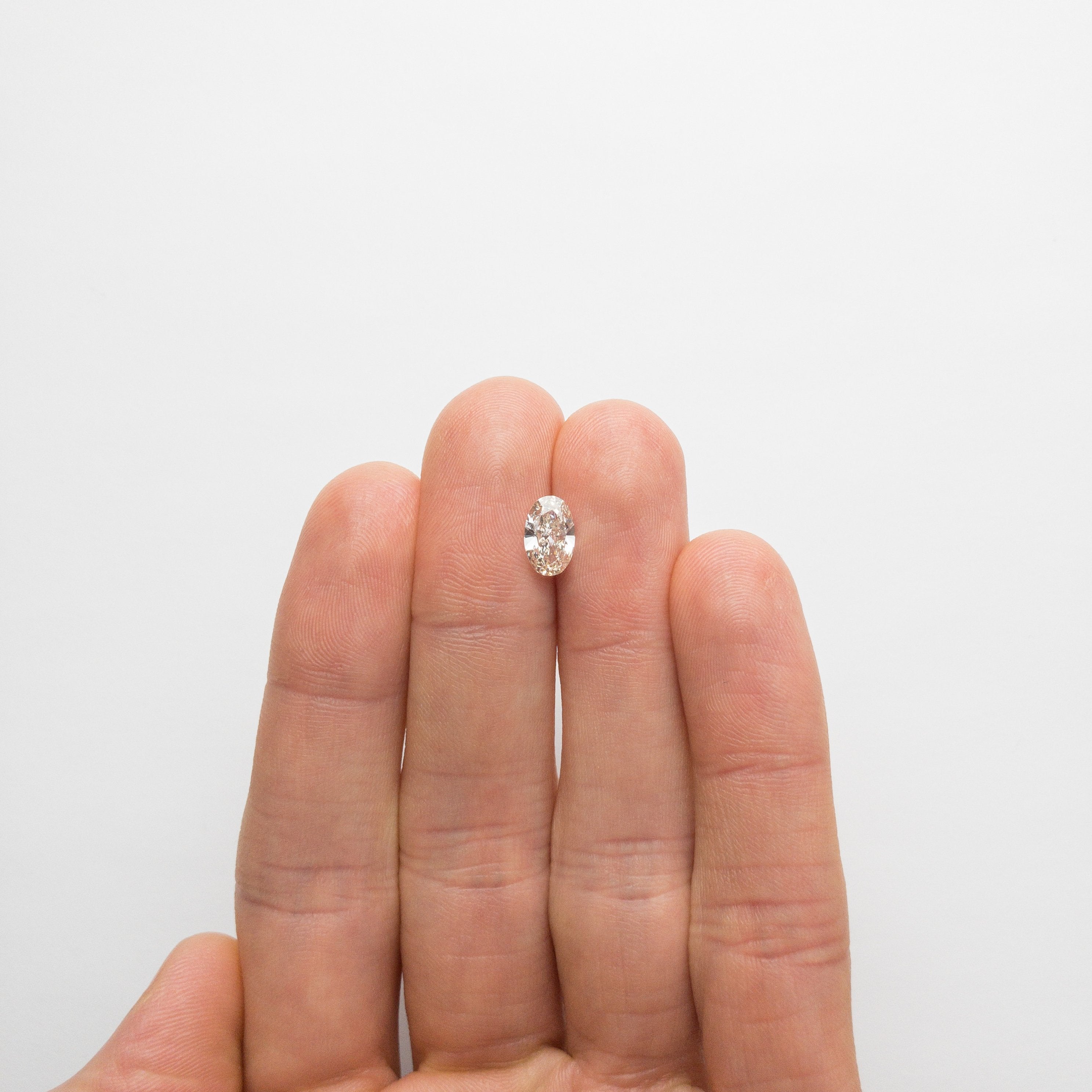 1.21ct 8.89x5.64x3.21mm VS2 Champagne Oval Brilliant 18534-01