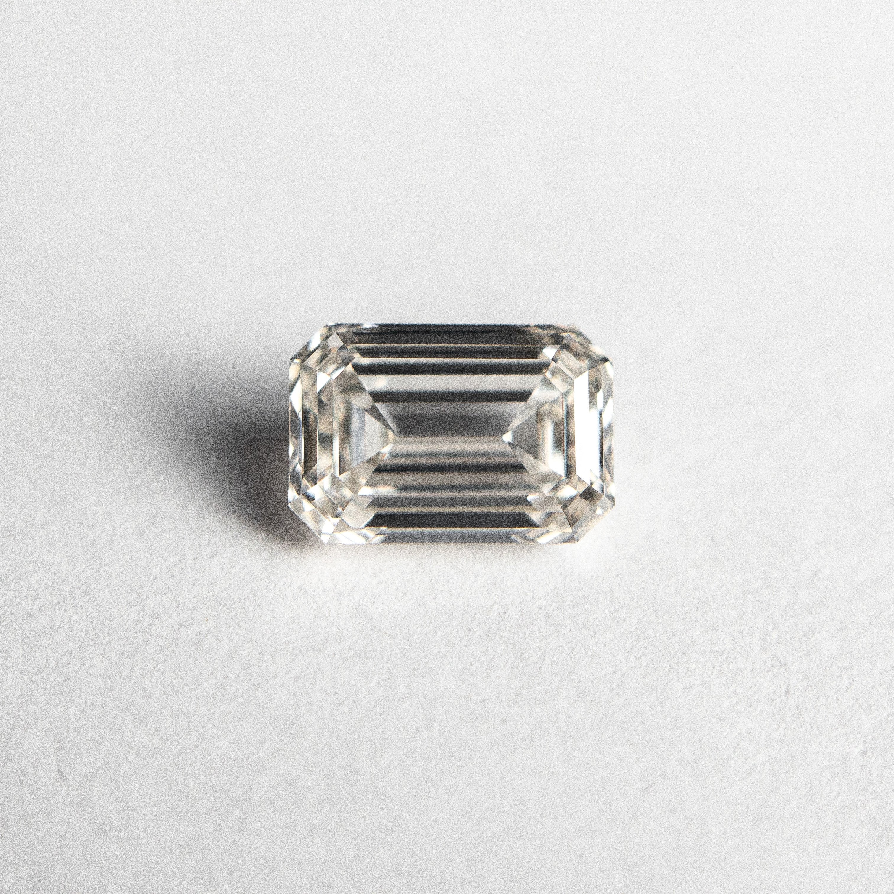 1.06ct 6.94x4.77x3.01mm VS2 Champagne Emerald Step Cut 18535-01