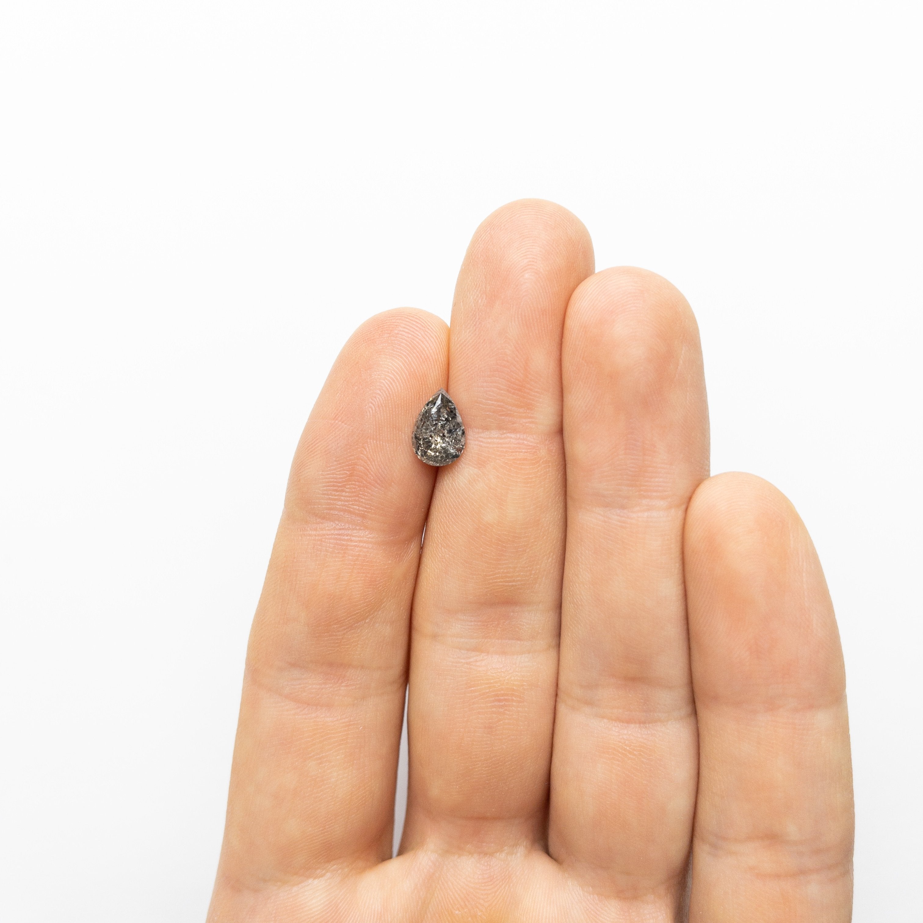 1.75ct 9.44x6.54x4.96mm Pear Brilliant 18554-01 hold D1947