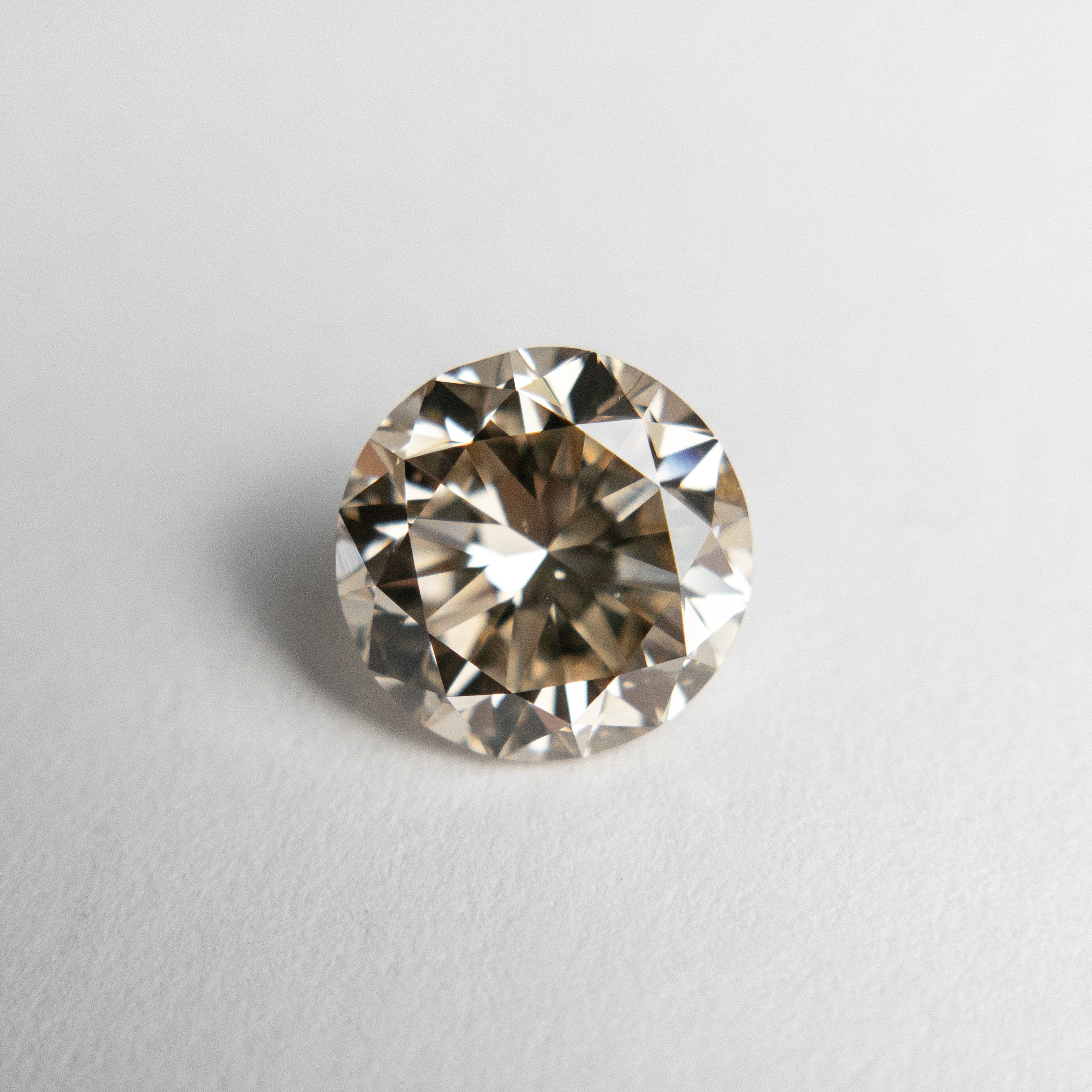 1.51ct 6.94x7.05x4.64mm GIA SI1 Champagne Round Brilliant 18627-01