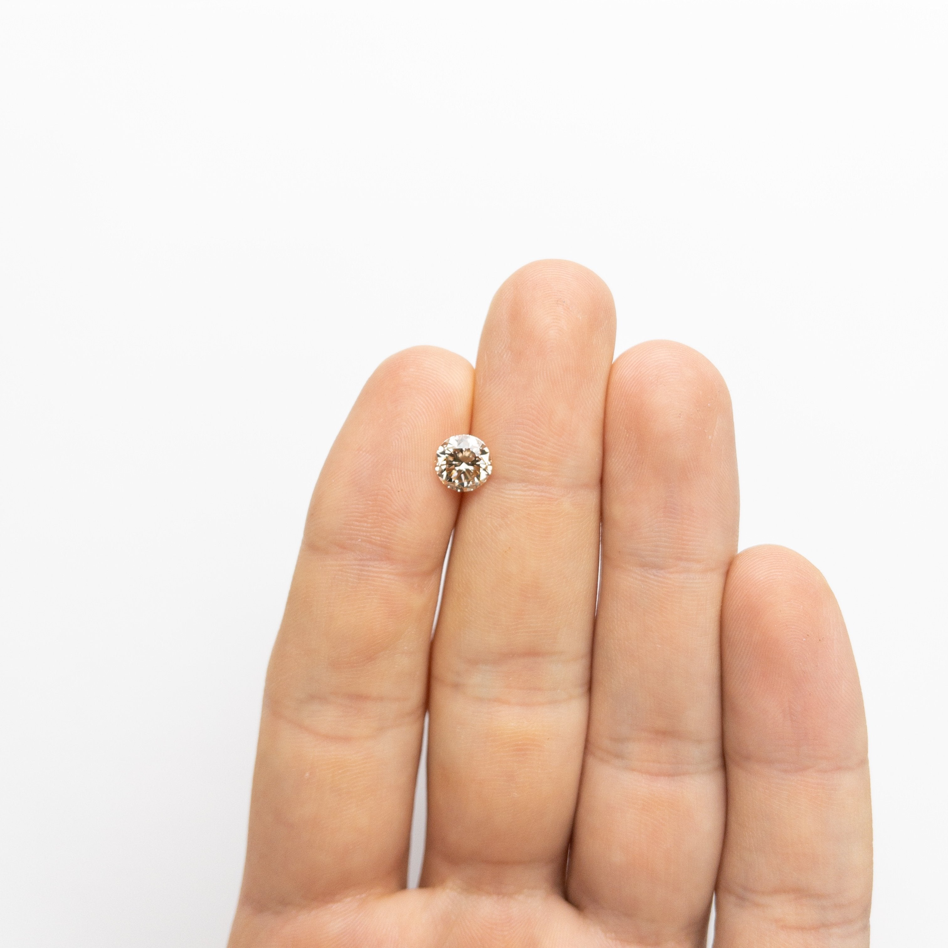 1.51ct 6.94x7.05x4.64mm GIA SI1 Champagne Round Brilliant 18627-01