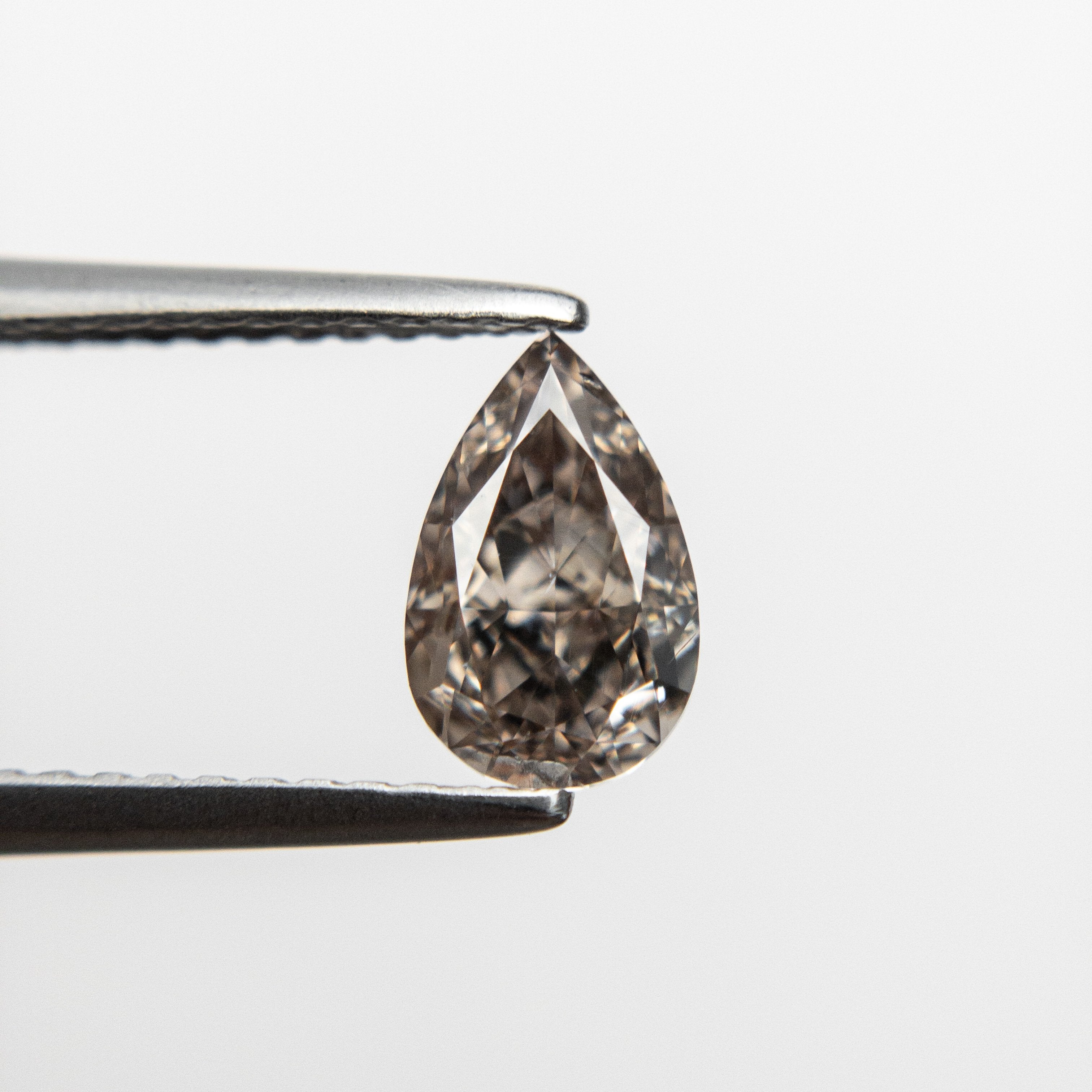 1.01ct 7.77x4.93x3.51mm GIA SI1 Champagne Pear Brilliant 18628-01