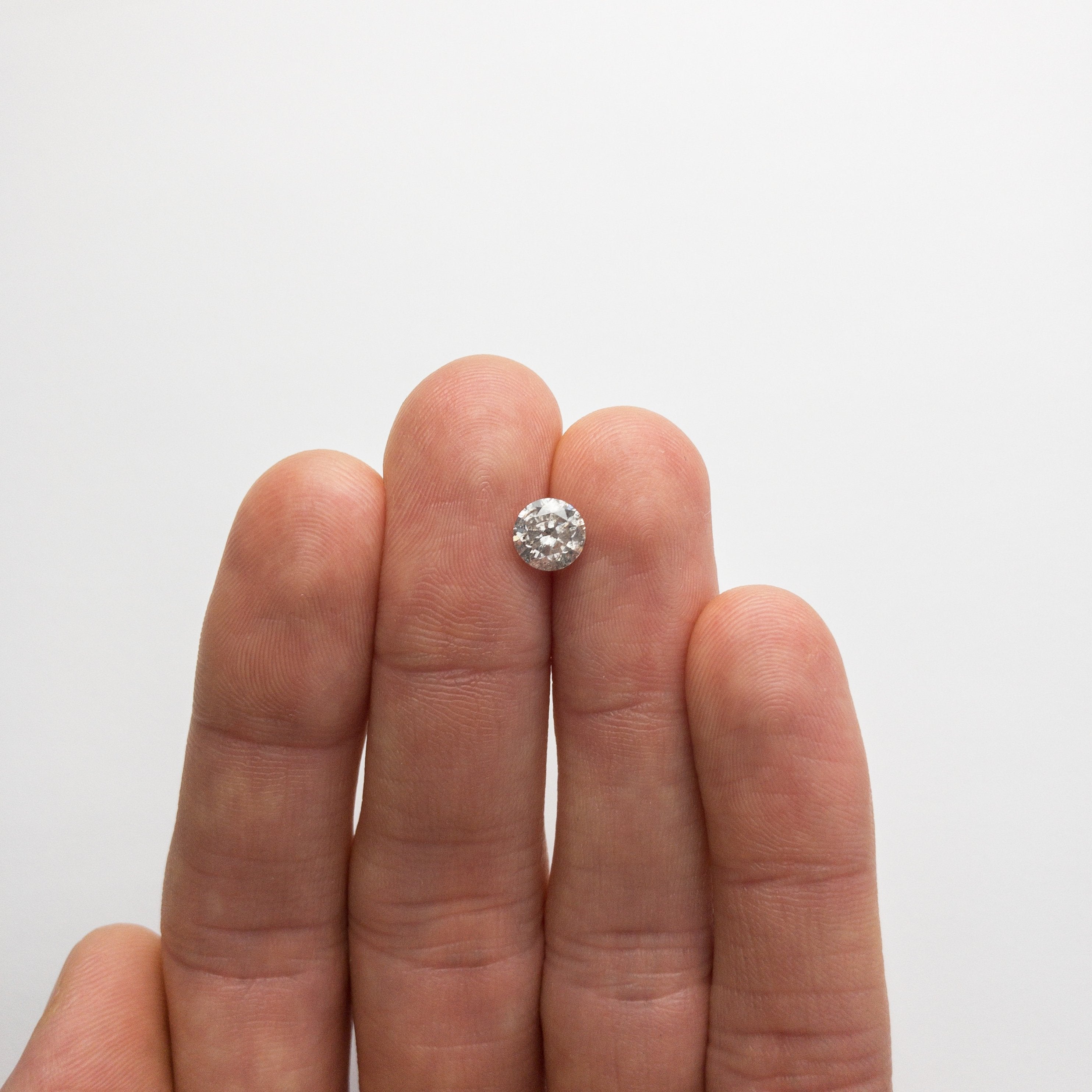 1.20ct 6.55x6.53x4.24mm Round Brilliant 18660-04 hold D1913