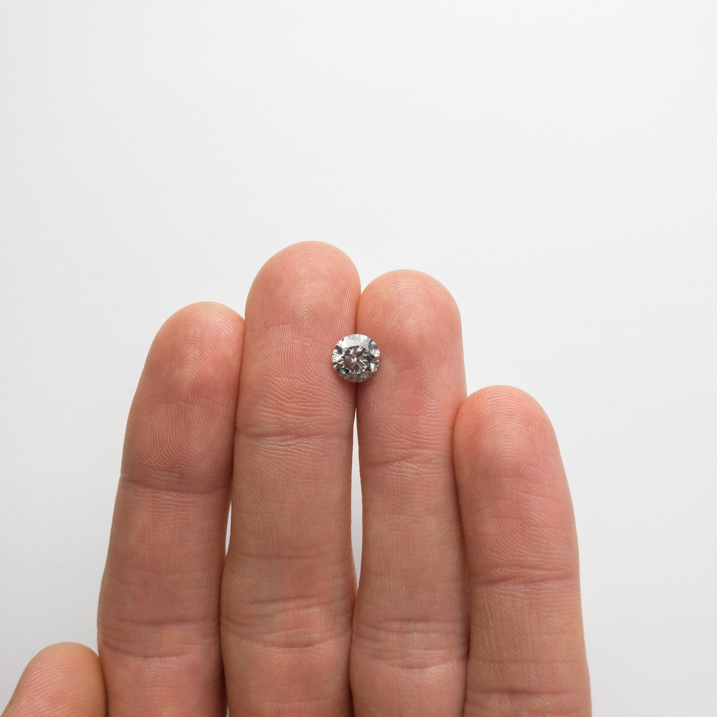 1.28ct 6.77x6.73x4.28mm Round Brilliant 18660-07