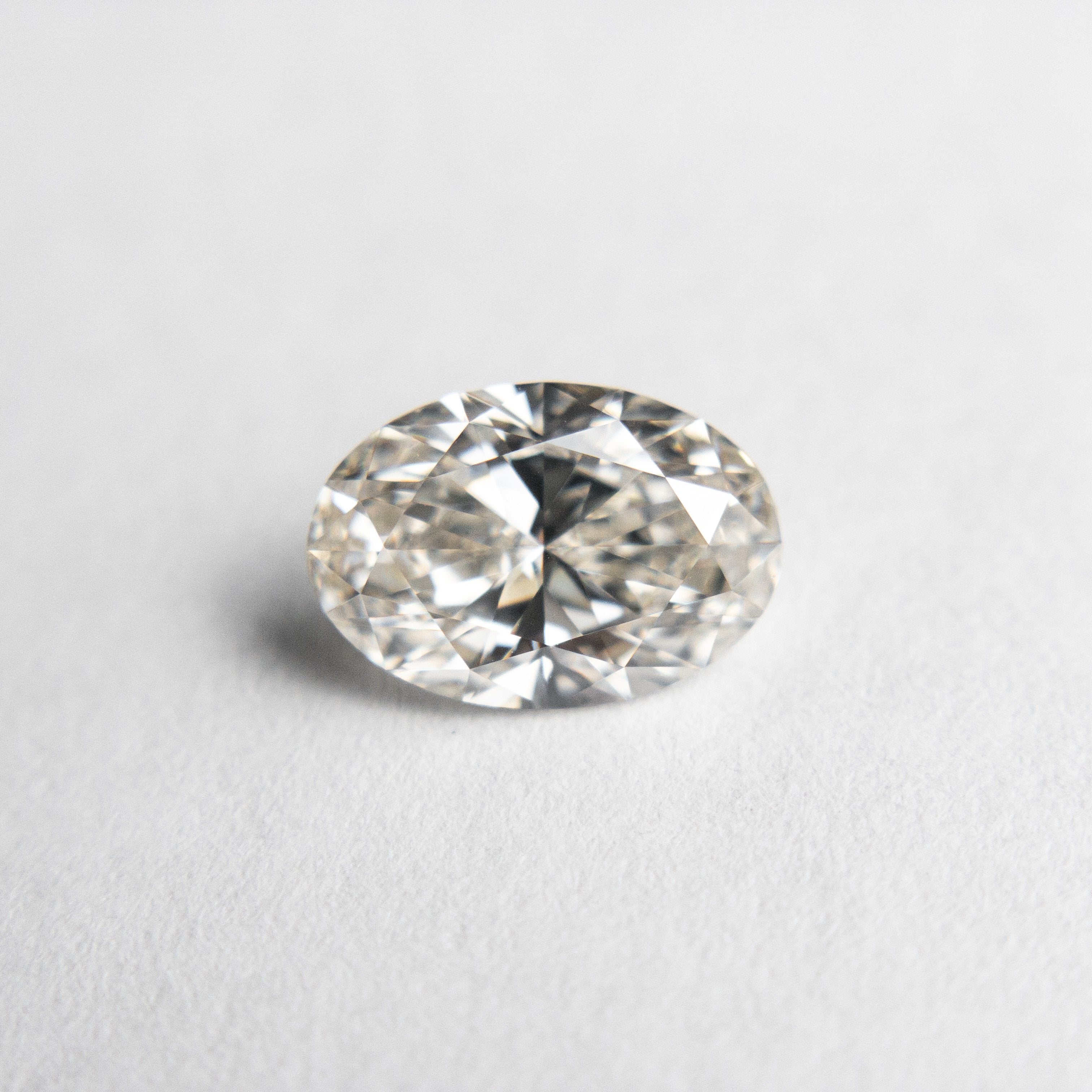 1.01ct 8.08x5.57x3.41mm GIA VVS2 K White Oval Brilliant 18694-01