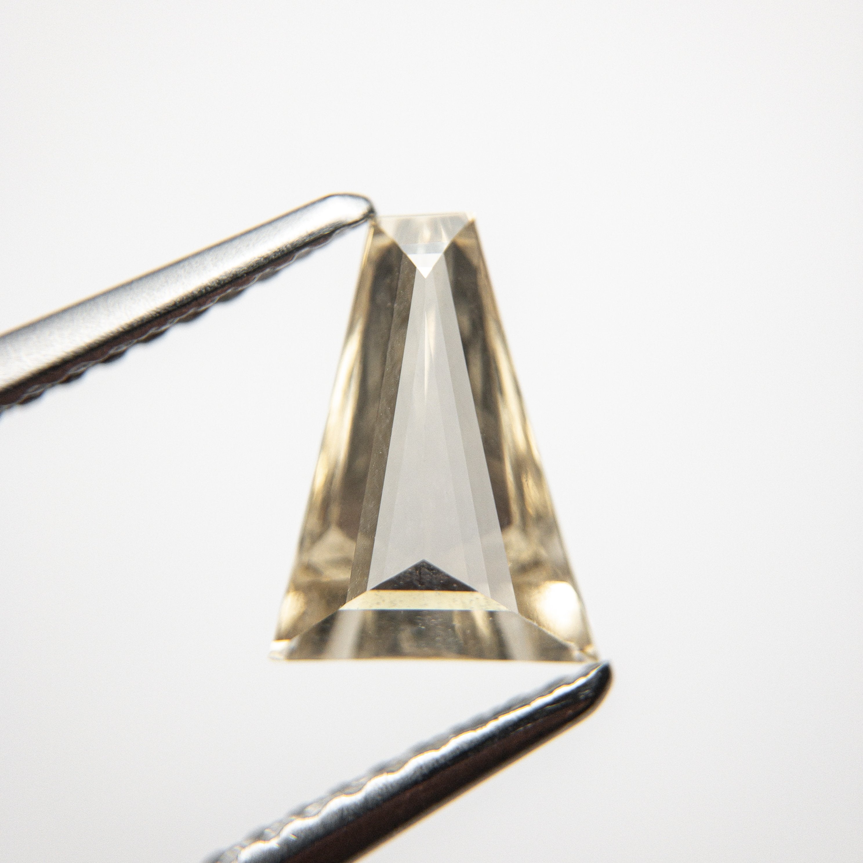 0.84ct 8.92x6.54x2.46 VS2/SI1+ Champagne Tapered Baguette Step Cut 18746-02