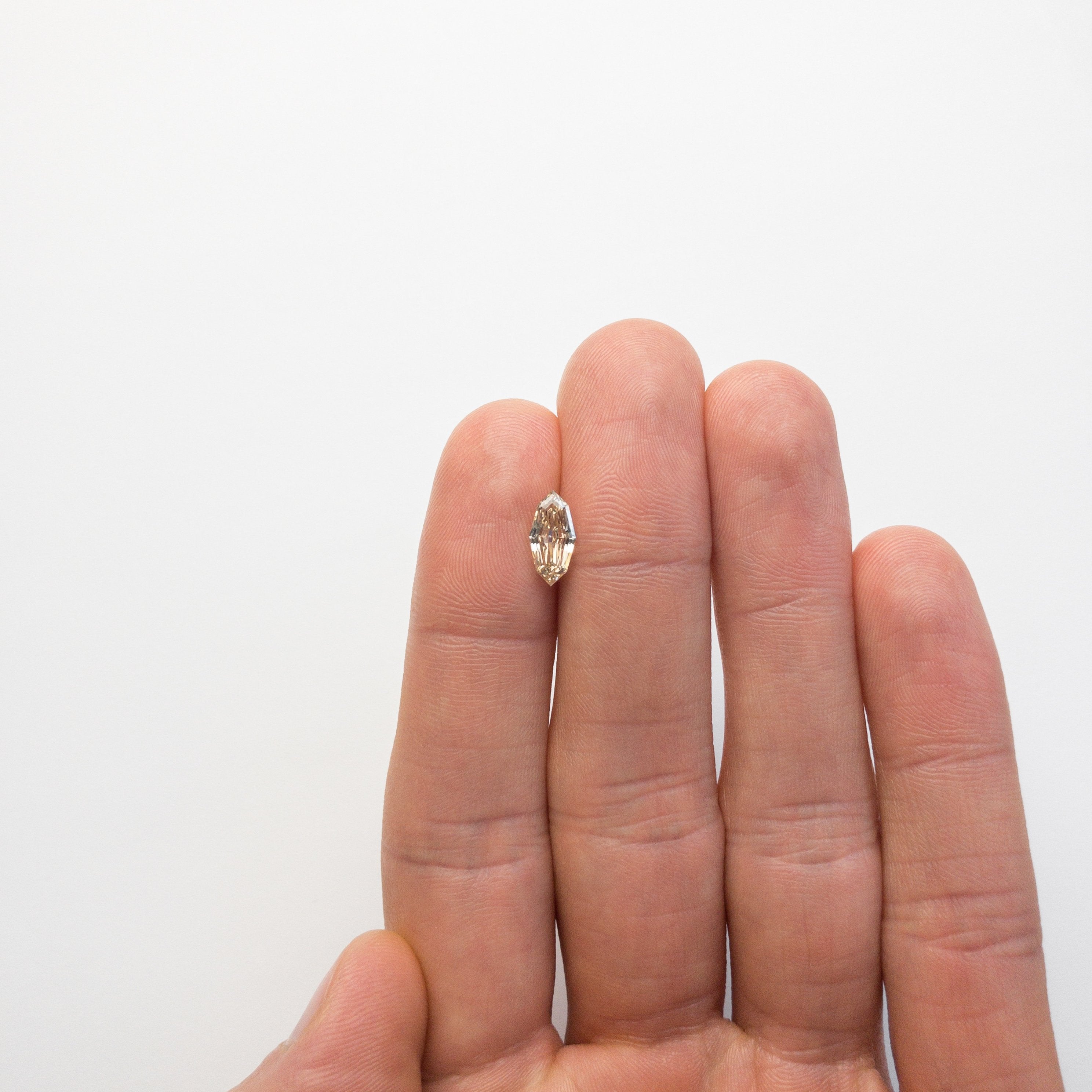1.07ct 10.53x5.12x2.83mm SI1 Champagne Step Cut Marquise 18839-02