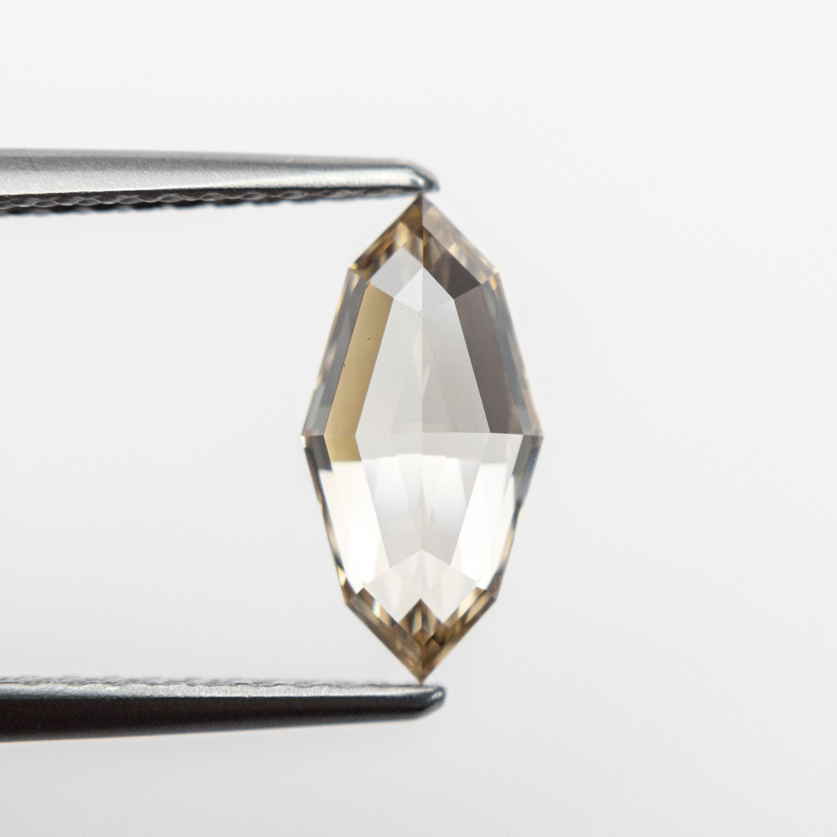 1.08ct 10.49x5.21x2.84mm SI1 Champagne Step Cut Marquise 18839-03