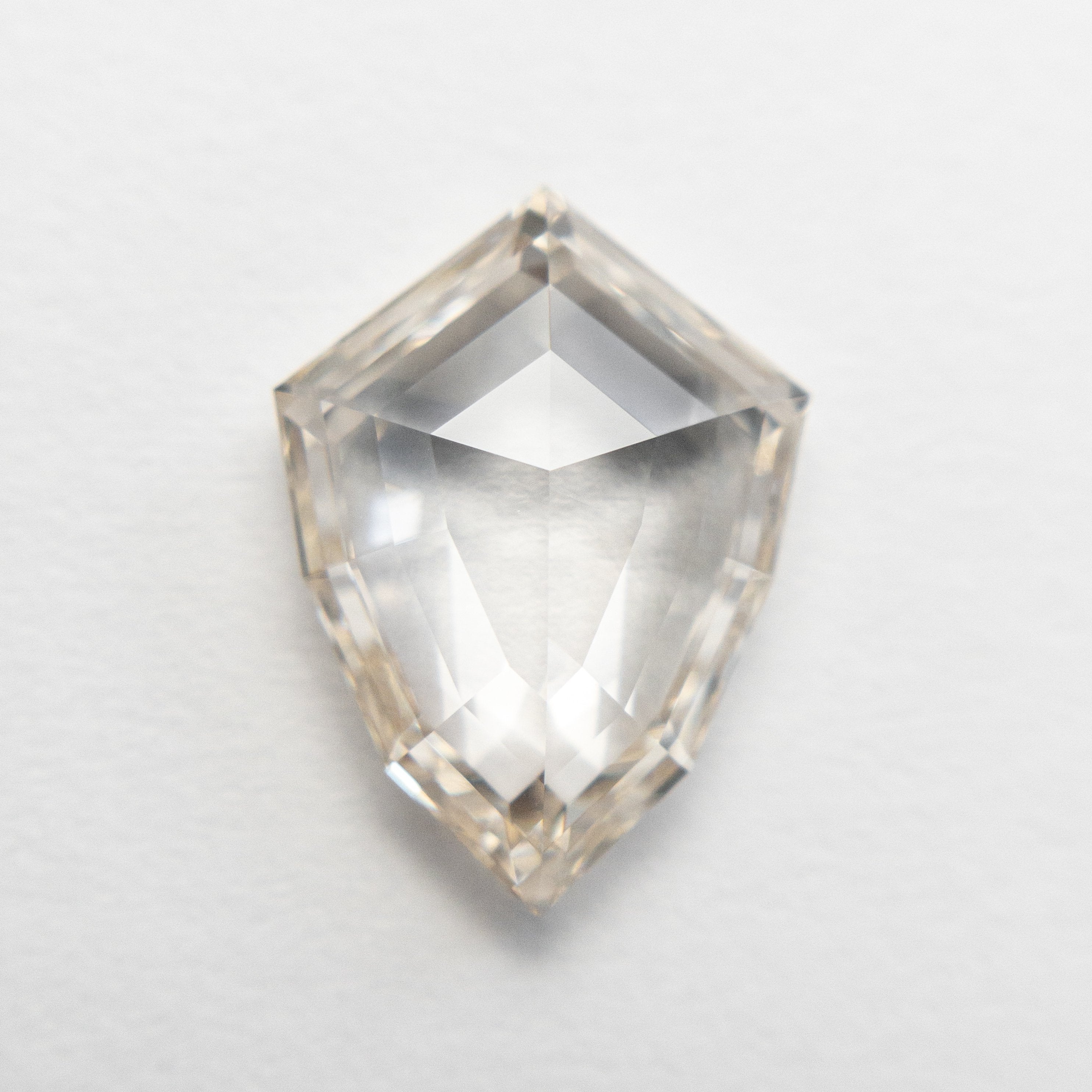 2.57ct 12.31x9.07x3.29mm VS1 Light Champagne Shield Rosecut 18854-01