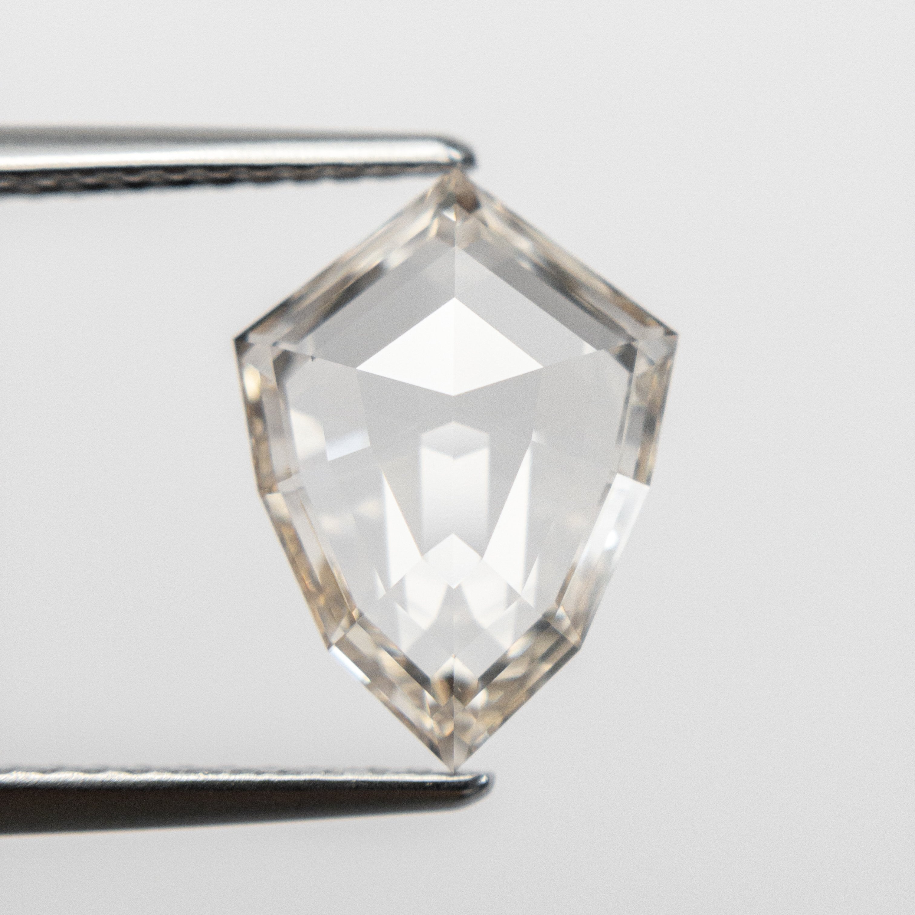 2.57ct 12.31x9.07x3.29mm VS1 Light Champagne Shield Rosecut 18854-01