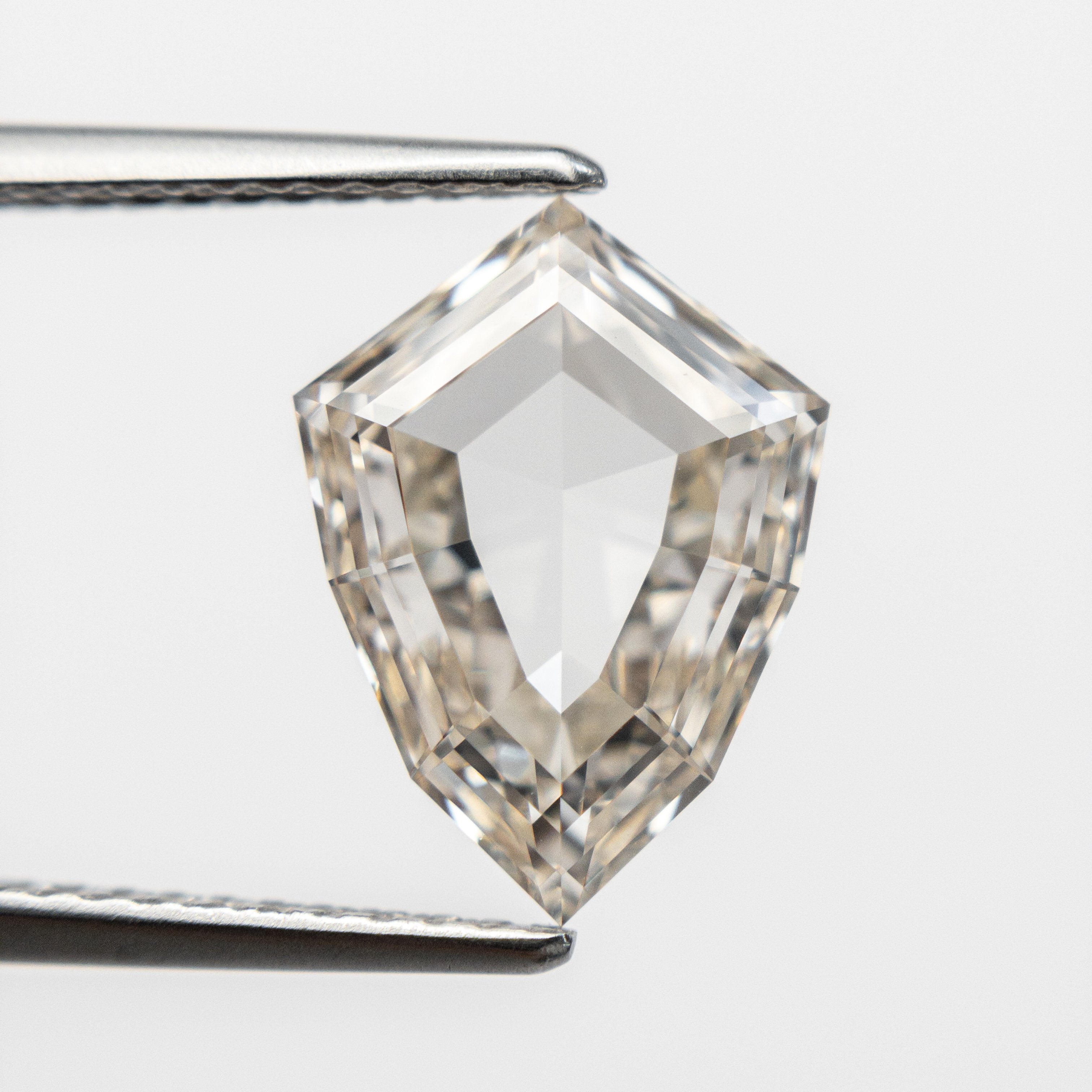 2.57ct 12.31x9.07x3.29mm VS1 Light Champagne Shield Rosecut 18854-01