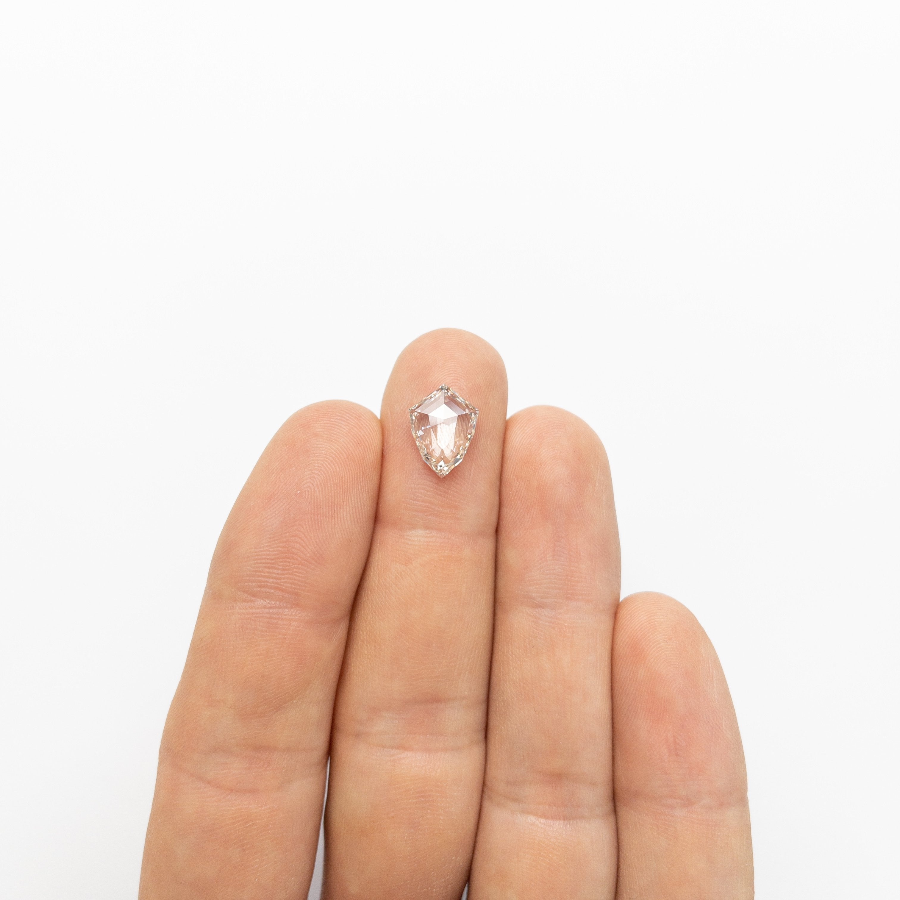 2.57ct 12.31x9.07x3.29mm VS1 Light Champagne Shield Rosecut 18854-01