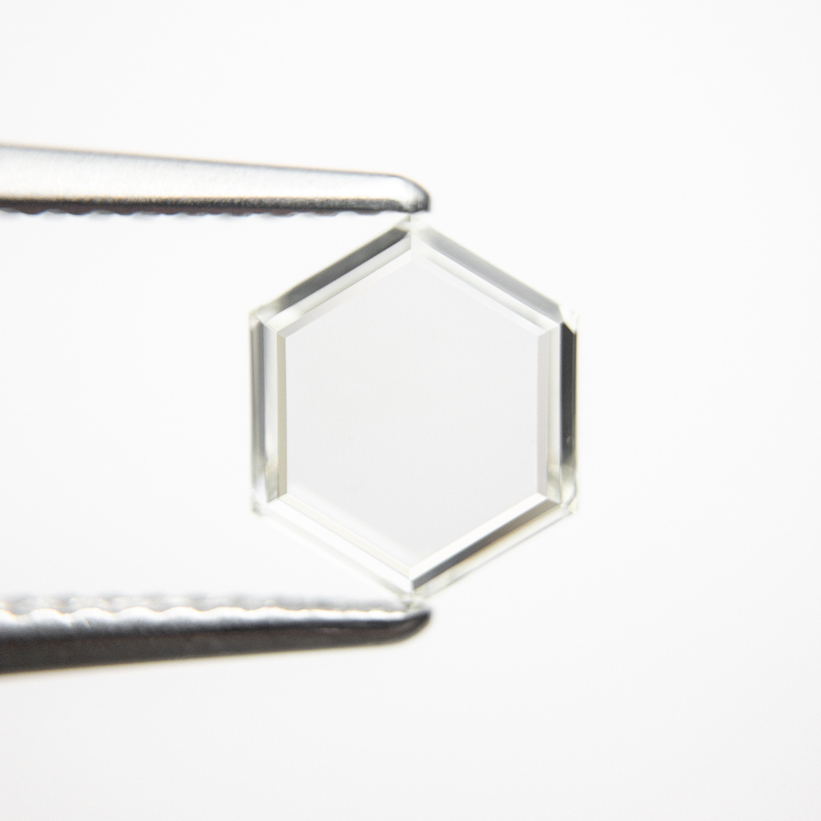 1.06ct 8.09x6.71x1.74mm VS O-P Hexagon Portrait 18878-05